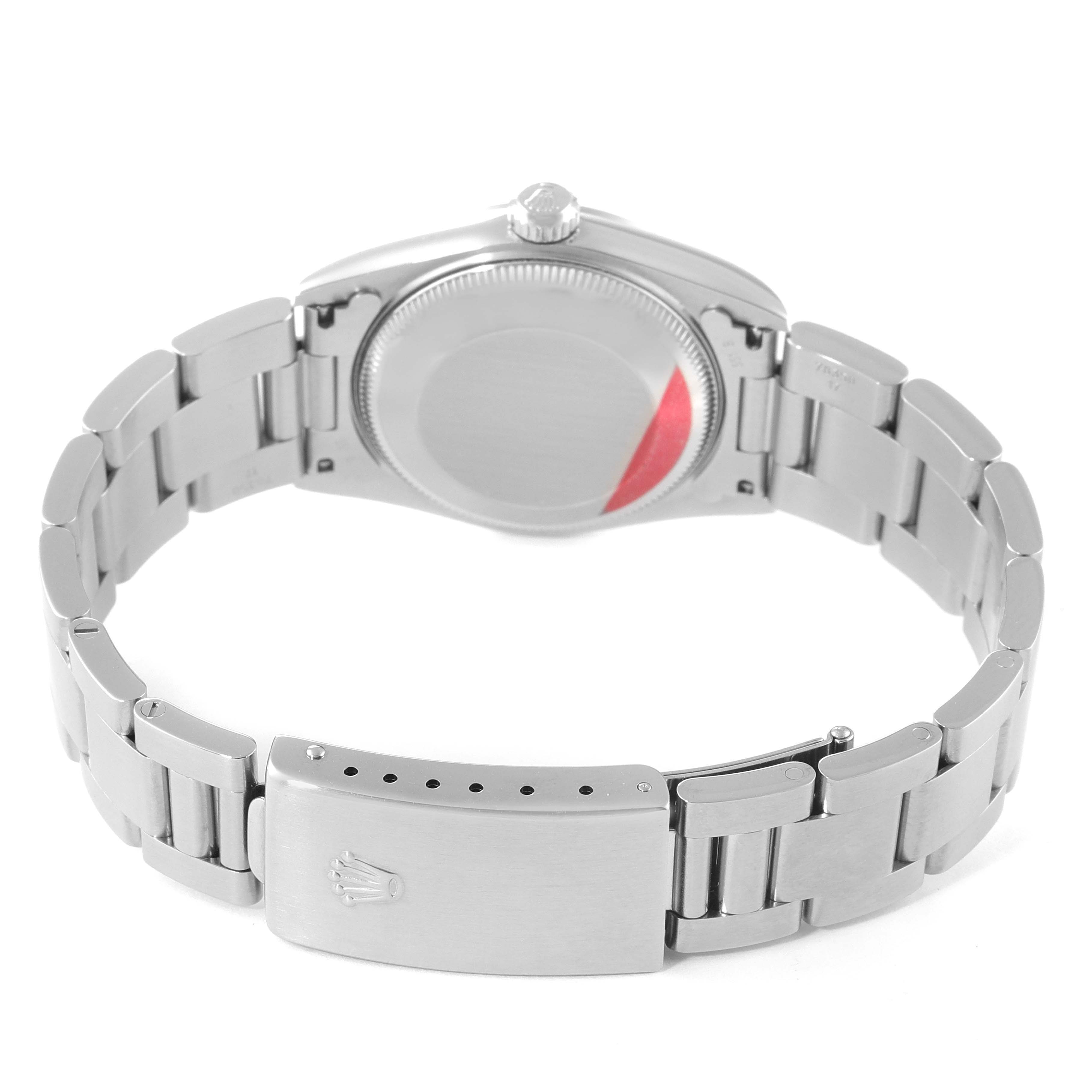 This image shows the back view and clasp of a Rolex Mid-Size 77080 Women
s Stainless Steel Pink Dial 77080 Women
s Stainless Steel Pink Dial watch.