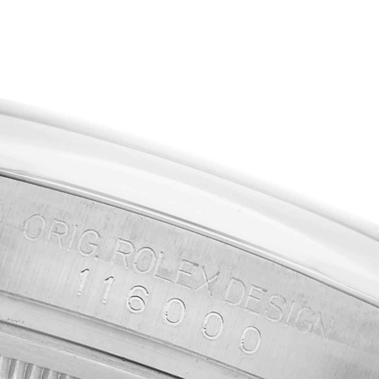 The image shows the side engraving of a Rolex Oyster Perpetual 116000 Men's Stainless Steel Champagne Dial 116000 Men's Stainless Steel Champagne Dial watch, highlighting model number 116000.