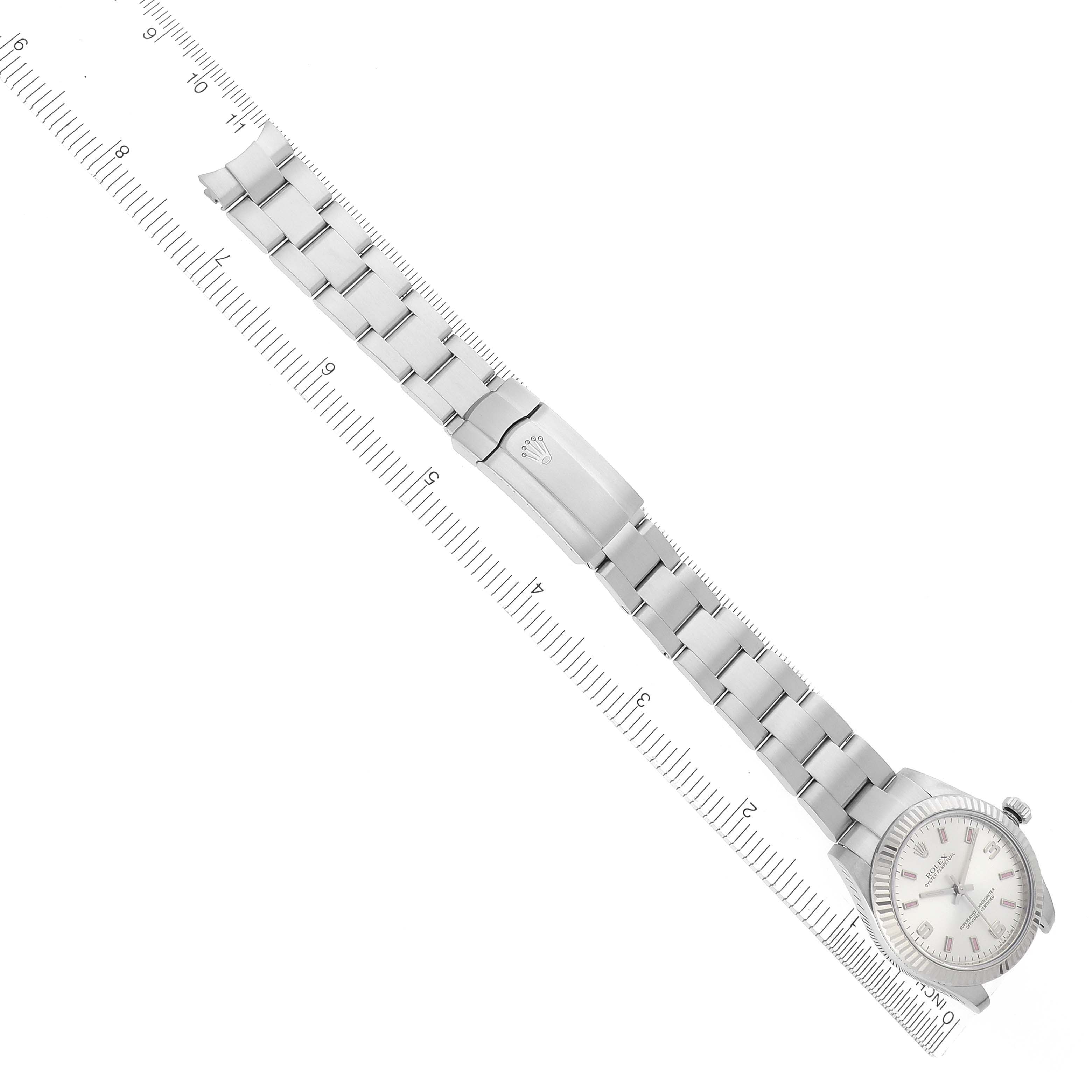 The Rolex Mid-Size 177234 Women's Stainless Steel Silver Dial 177234 Women's Stainless Steel Silver Dial watch is shown from a top-down angle, displaying the full bracelet, clasp, and watch face.