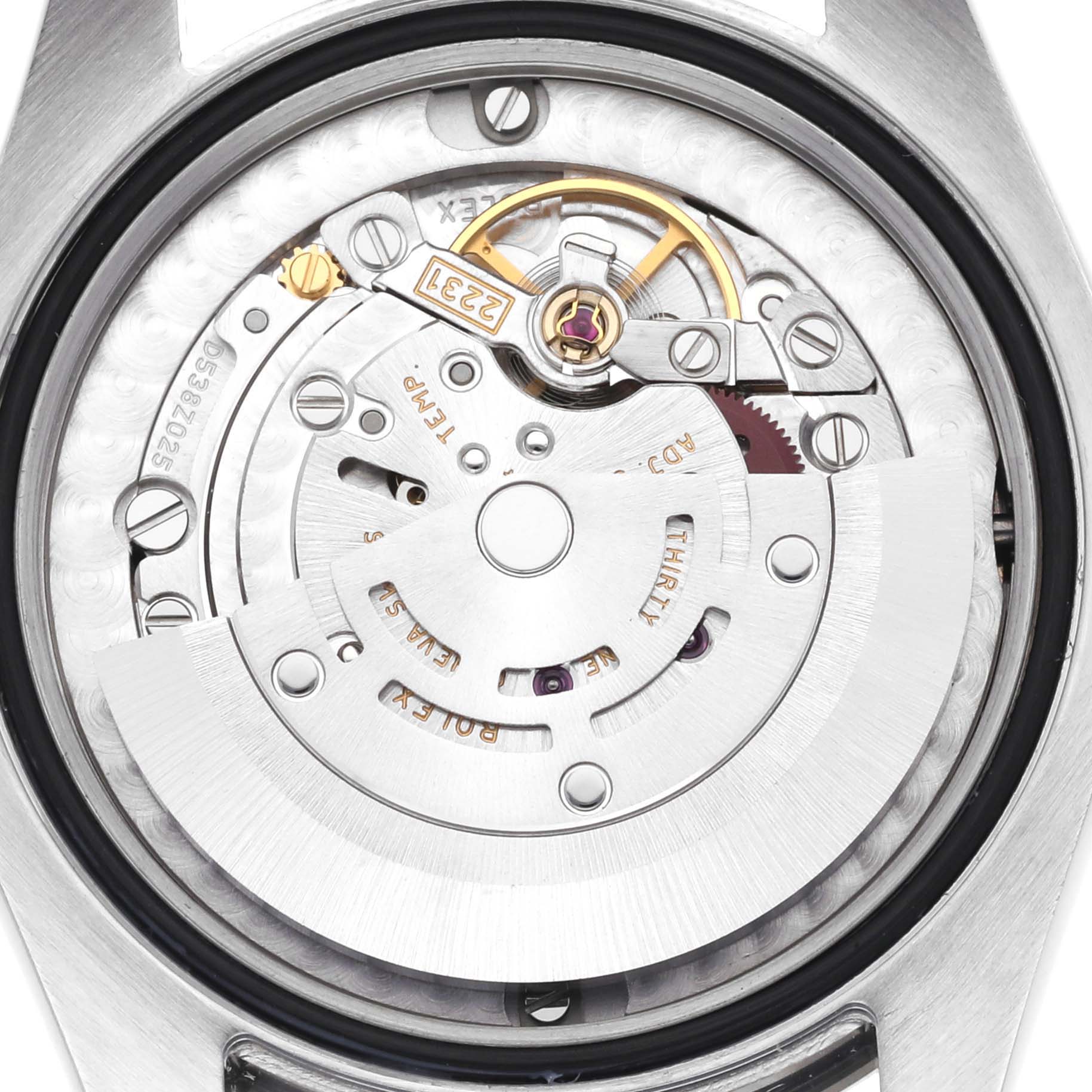 The image shows the exposed movement of a Rolex Mid-Size 177234 Women's Stainless Steel Silver Dial 177234 Women's Stainless Steel Silver Dial watch, focusing on the rotor and internal components from a rear angle.