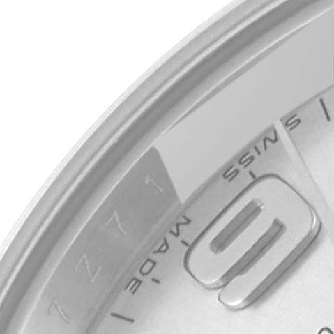 The image shows a close-up of the dial of a Rolex Oyster Perpetual 176200 Women's Stainless Steel Silver Dial 176200 Women's Stainless Steel Silver Dial model, highlighting the edge of the face and part of the number 9.