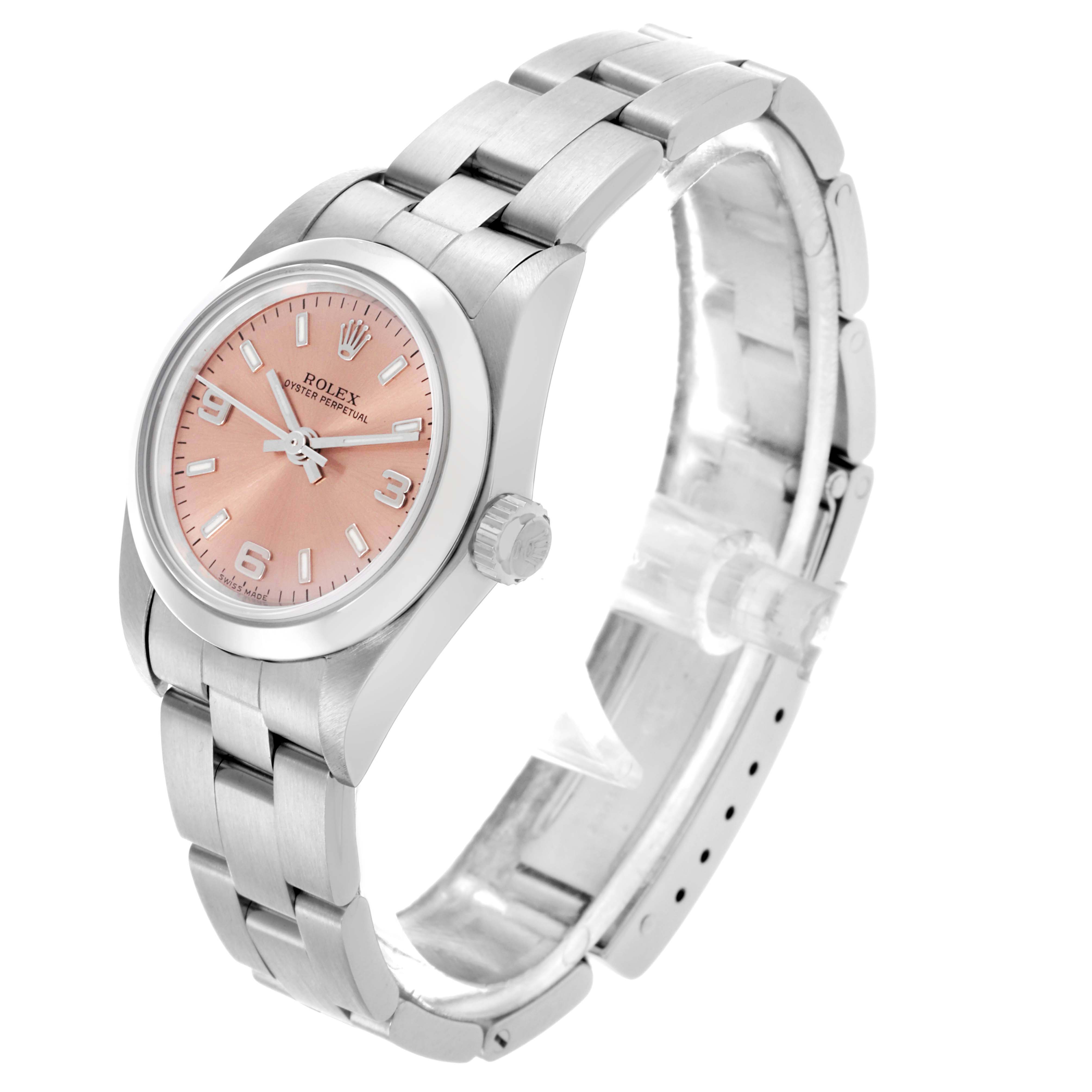 The Rolex Oyster Perpetual 76080 Women's Stainless Steel Pink Dial 76080 Women's Stainless Steel Pink Dial watch is shown at a three-quarter angle, highlighting the face, bezel, and bracelet.