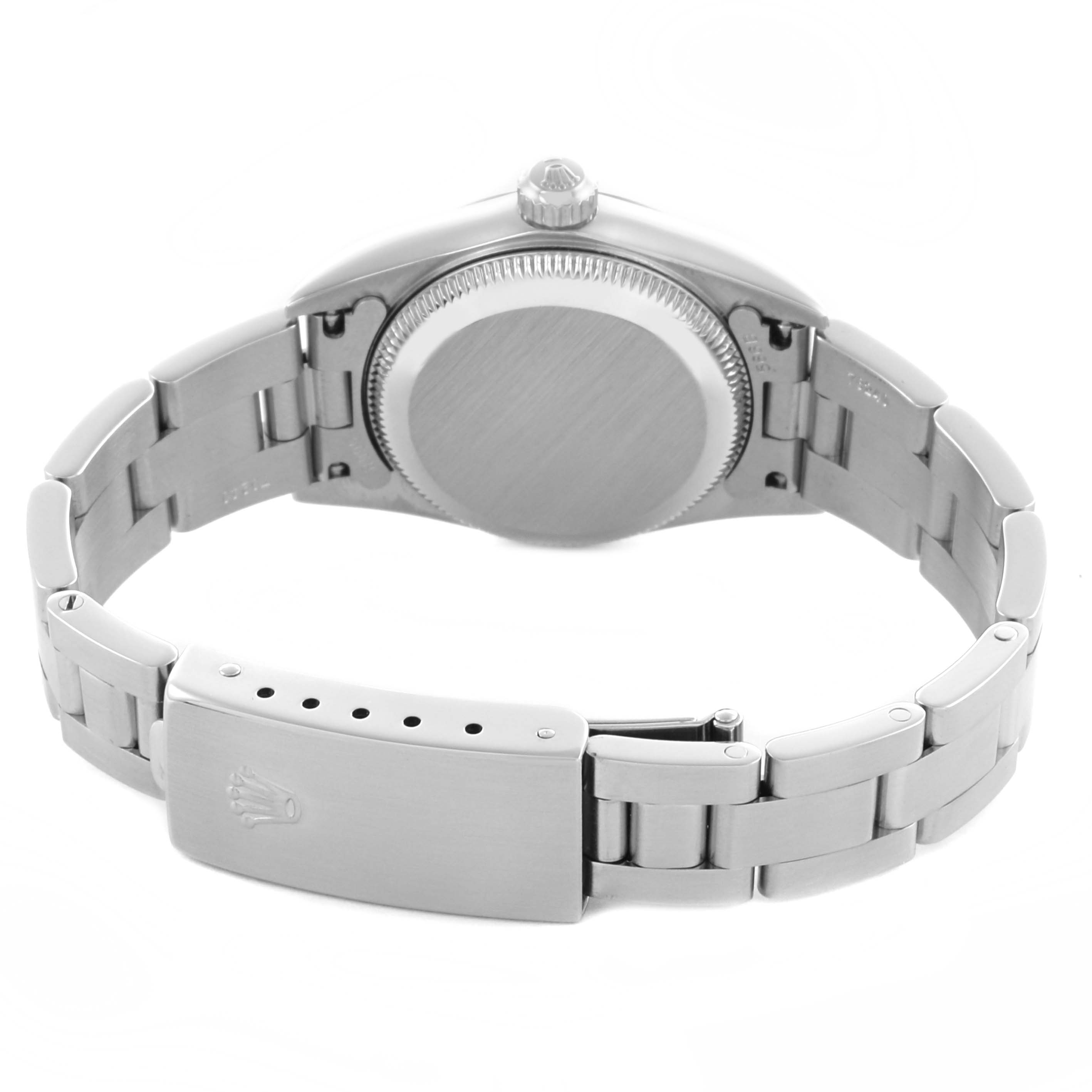 The image shows the back angle of a Rolex Oyster Perpetual 76080 Women's Stainless Steel Pink Dial 76080 Women's Stainless Steel Pink Dial watch, highlighting the case back and bracelet clasp.