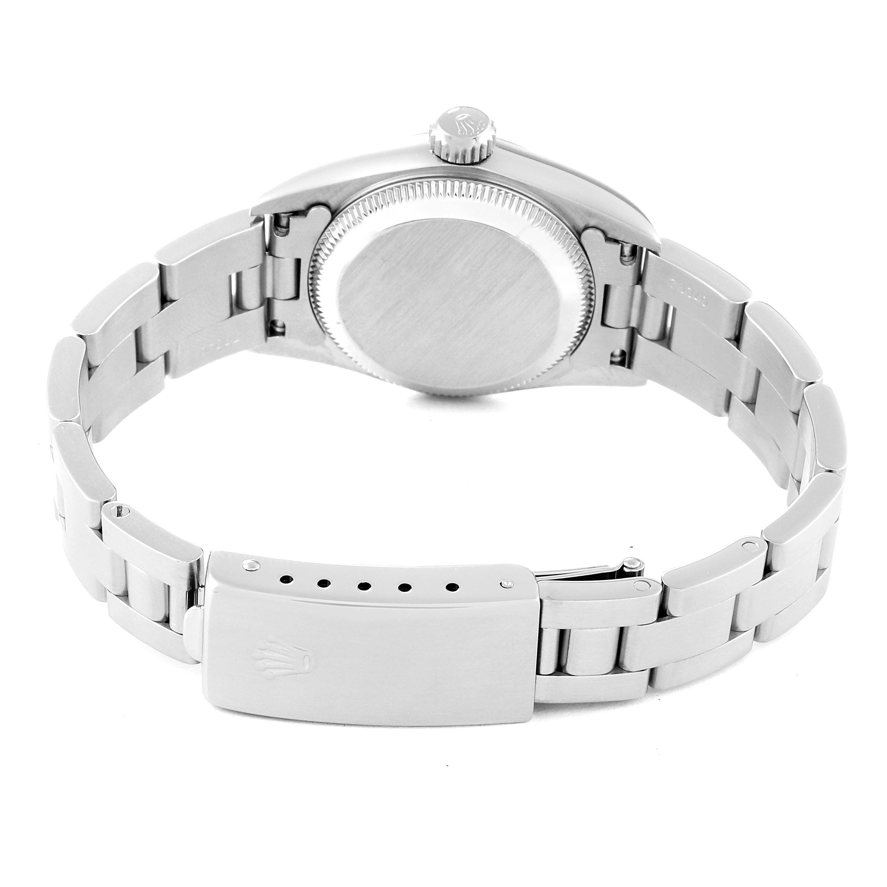 This image shows the back view of a Rolex Oyster Perpetual 67180 Women's Stainless Steel Black Dial 67180 Women's Stainless Steel Black Dial watch, focusing on the case back, crown, and clasp.