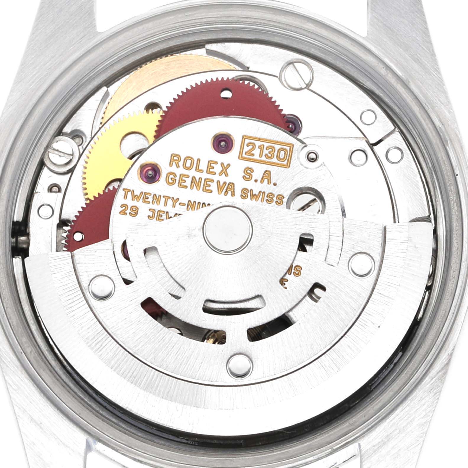 This image shows the movement of a Rolex Oyster Perpetual 67180 Women's Stainless Steel Black Dial 67180 Women's Stainless Steel Black Dial watch viewed from the back, highlighting the intricate gears and rotor.