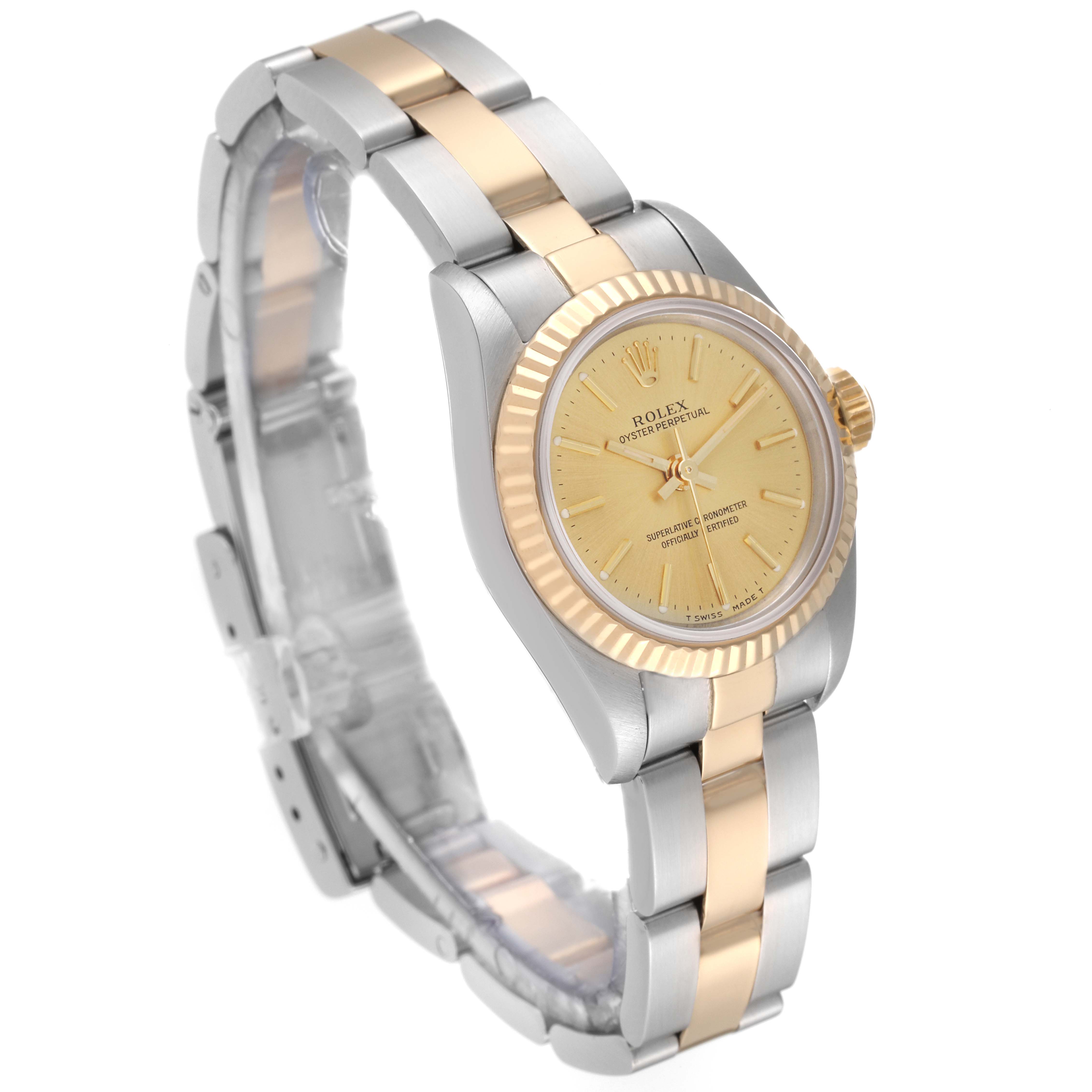 This image shows a Rolex Oyster Perpetual 67193 Women's Steel and Gold (two tone) Champagne Dial 67193 Women's Steel and Gold (two tone) Champagne Dial watch at a three-quarter angle, highlighting the gold and silver bracelet and gold dial.