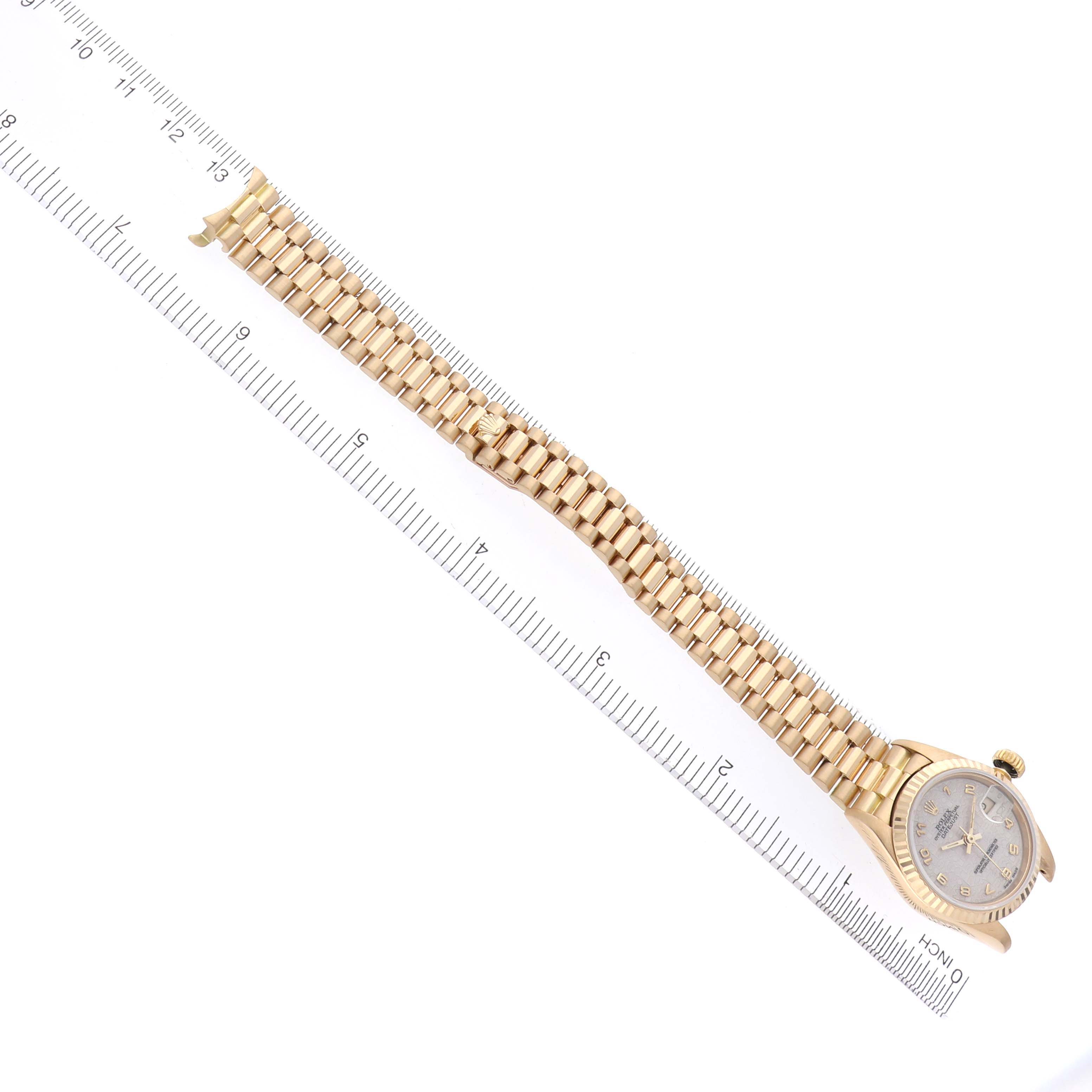 The image shows the Rolex President 69178 Women's Yellow Gold White Dial 69178 Women's Yellow Gold White Dial model watch laid flat, displaying the full bracelet and watch face from a top-down angle.