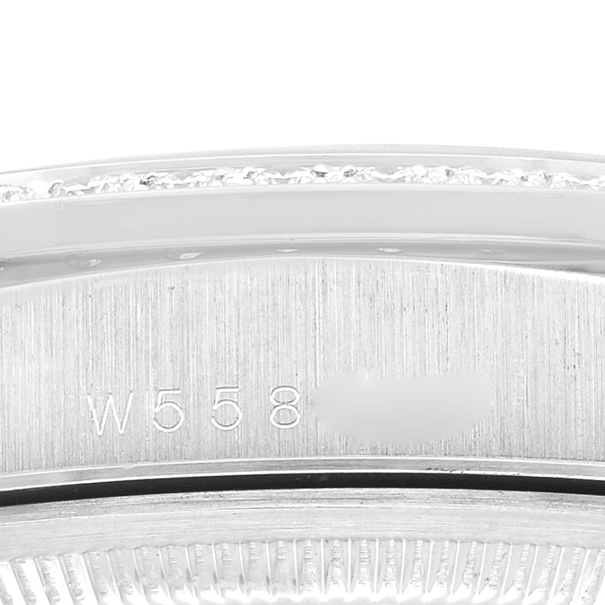 This image shows a close-up of the serial number engraving on the caseback of a Rolex President 18346 Men's Platinum Blue Dial 18346 Men's Platinum Blue Dial model watch.
