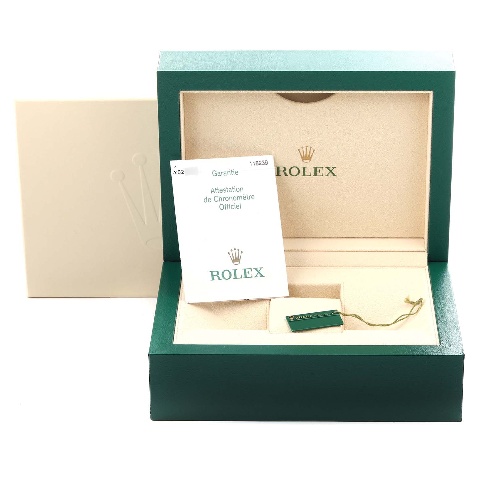 The image shows the packaging for a Rolex President 118239 Men's White Gold Mother of Pearl Dial 118239 Men's White Gold Mother of Pearl Dial model, including the green box, certificate, and tag.