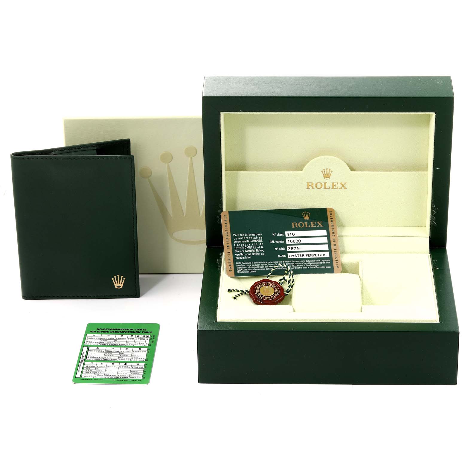 This image shows accessories of a Rolex Sea-Dweller 16600 Men's Stainless Steel Black Dial 16600 Men's Stainless Steel Black Dial, including a watch box, warranty card, booklet, and hang tag.