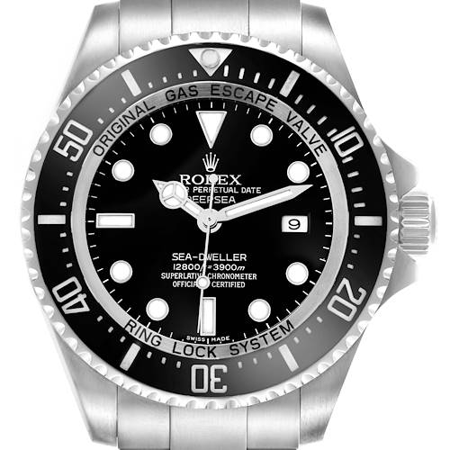 The Rolex Sea-Dweller watch is shown from the front, highlighting the bezel, dial, and crown.