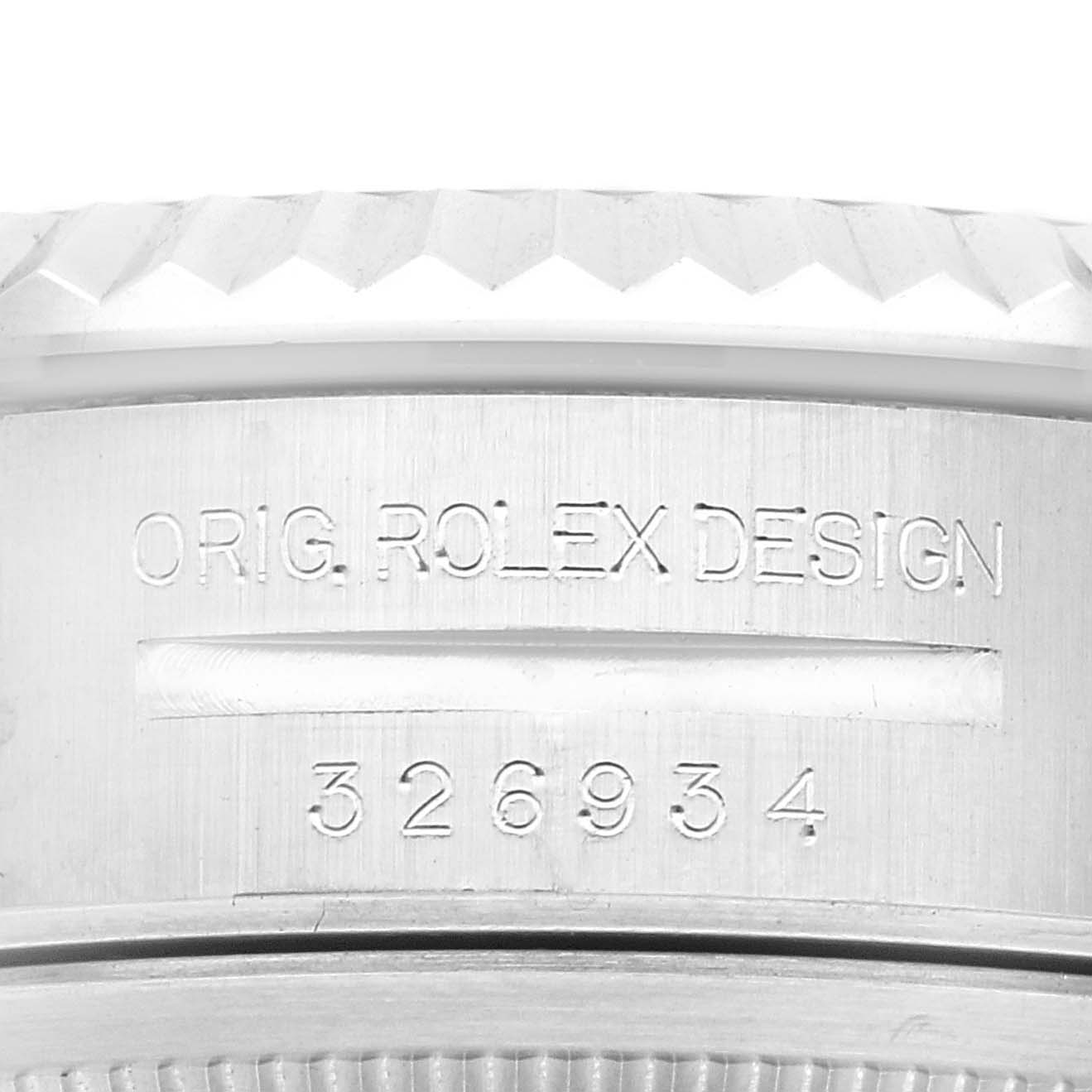 This is a close-up image showing the side of a Rolex Sky-Dweller 326934 Men
s Stainless Steel Black Dial 326934 Men
s Stainless Steel Black Dial watch, including the engraved text "Orig. Rolex Design" and the model number 326934.