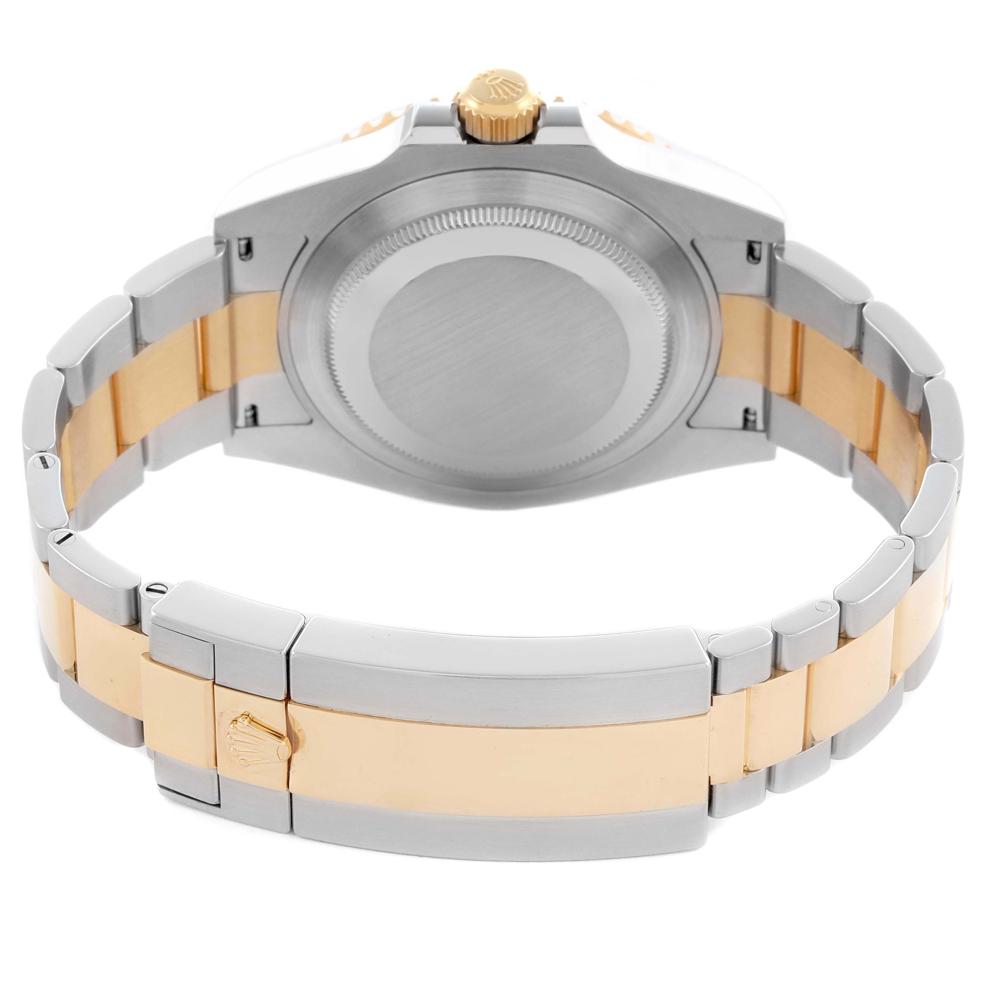 The image shows the back of the Rolex Submariner 126613LN Men's Steel and Gold (two tone) Black Dial 126613LN Men's Steel and Gold (two tone) Black Dial, featuring the case back, crown, and two-tone bracelet.