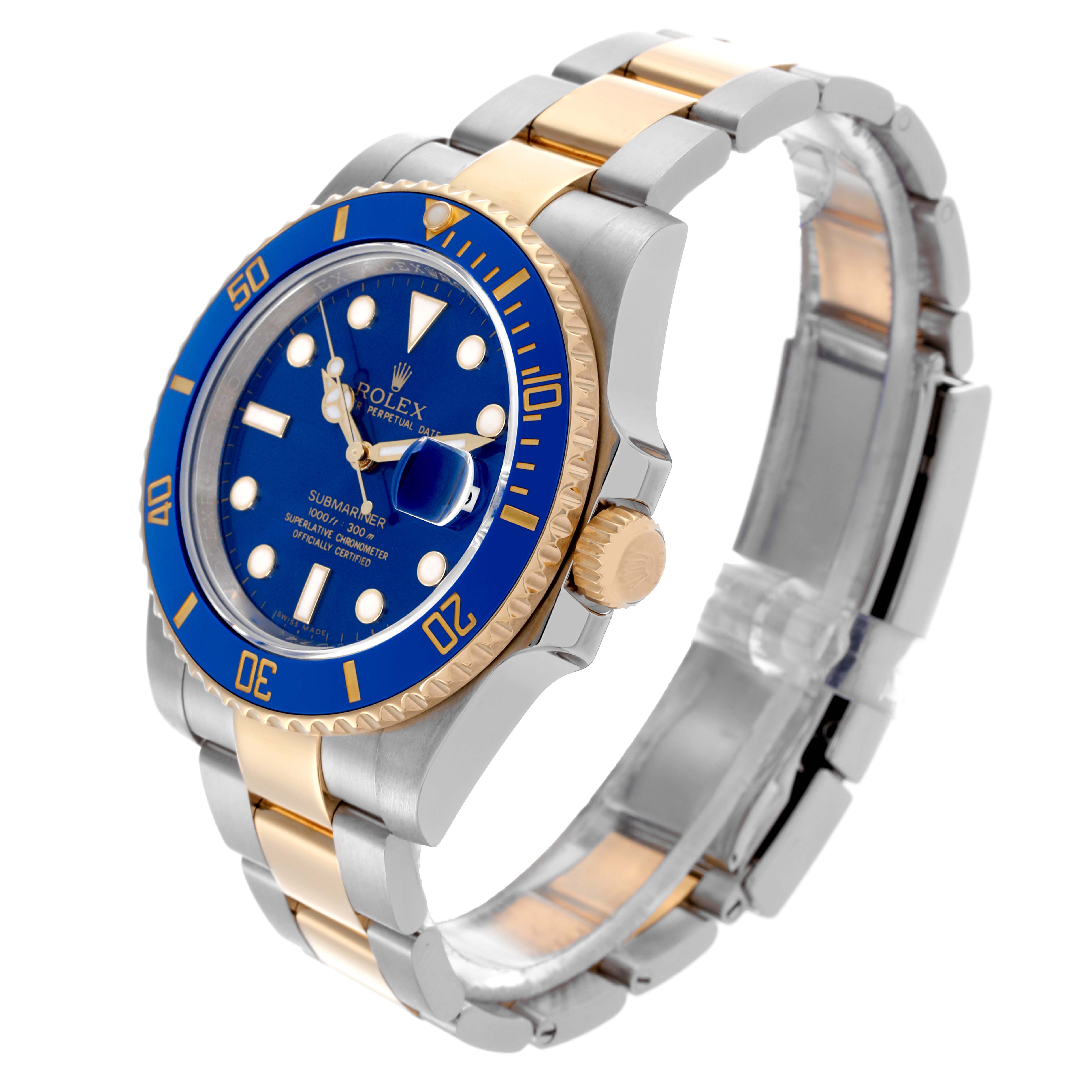 The Rolex Submariner 116613LB Men's Steel and Gold (two tone) Blue Dial 116613LB Men's Steel and Gold (two tone) Blue Dial watch is shown at an angled view highlighting the blue dial, gold and silver bracelet, bezel, and crown.