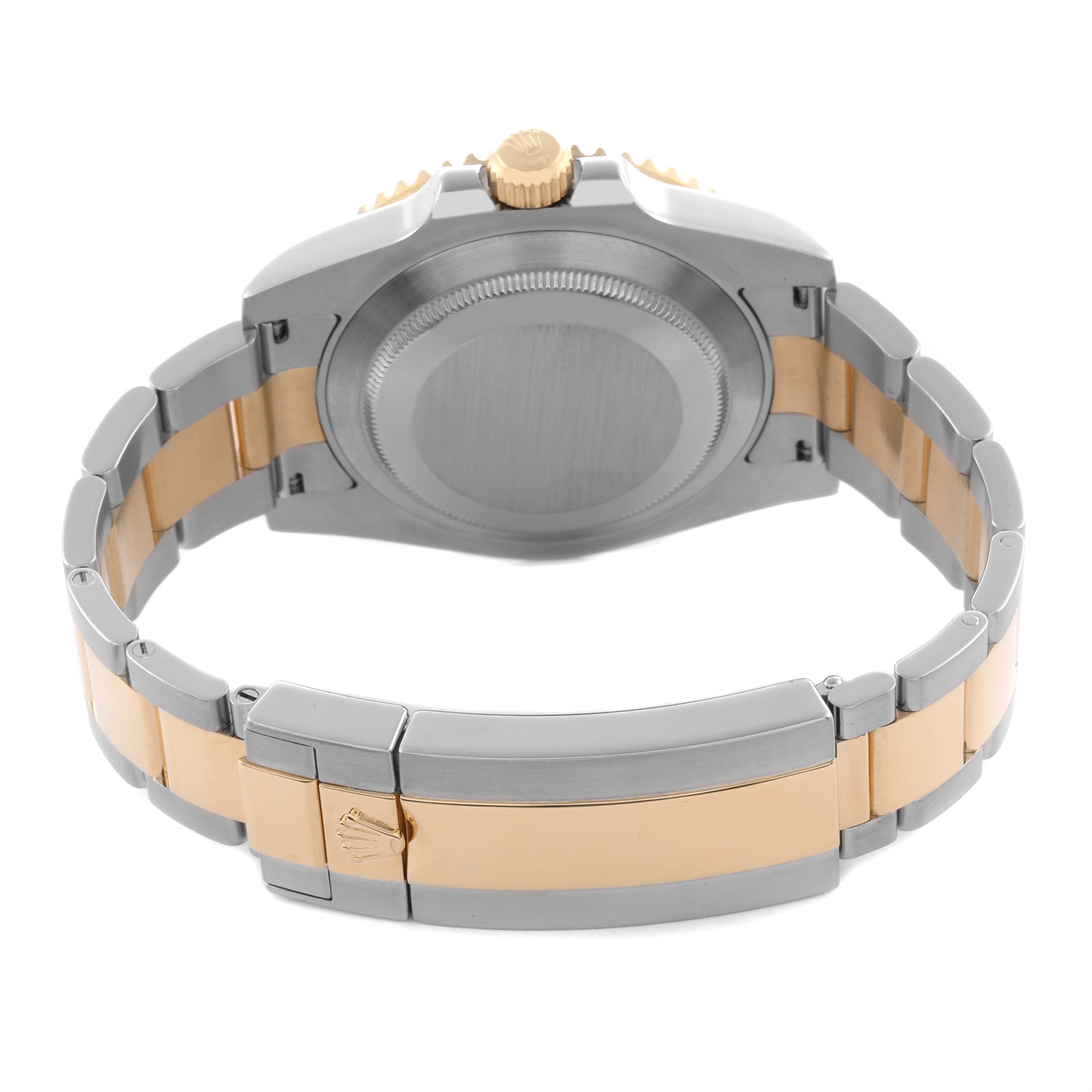The image shows the back of a Rolex Submariner 116613LB Men's Steel and Gold (two tone) Blue Dial 116613LB Men's Steel and Gold (two tone) Blue Dial watch, highlighting the bracelet and clasp.