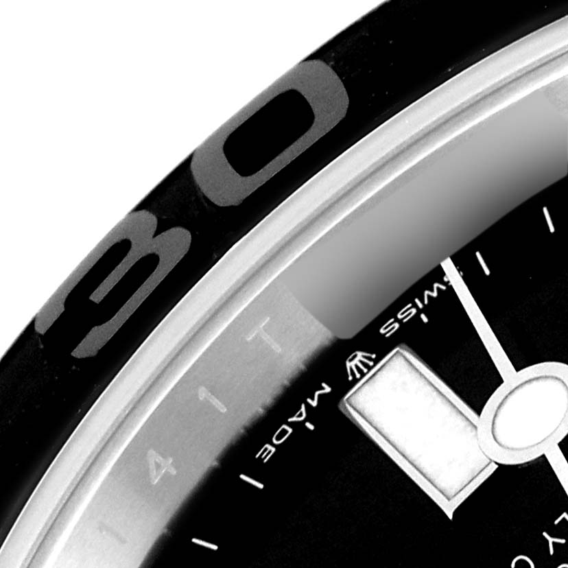 This image shows a close-up of the bezel and part of the dial of a Rolex Yacht-Master 226659 Men's White Gold Black Dial 226659 Men's White Gold Black Dial watch.