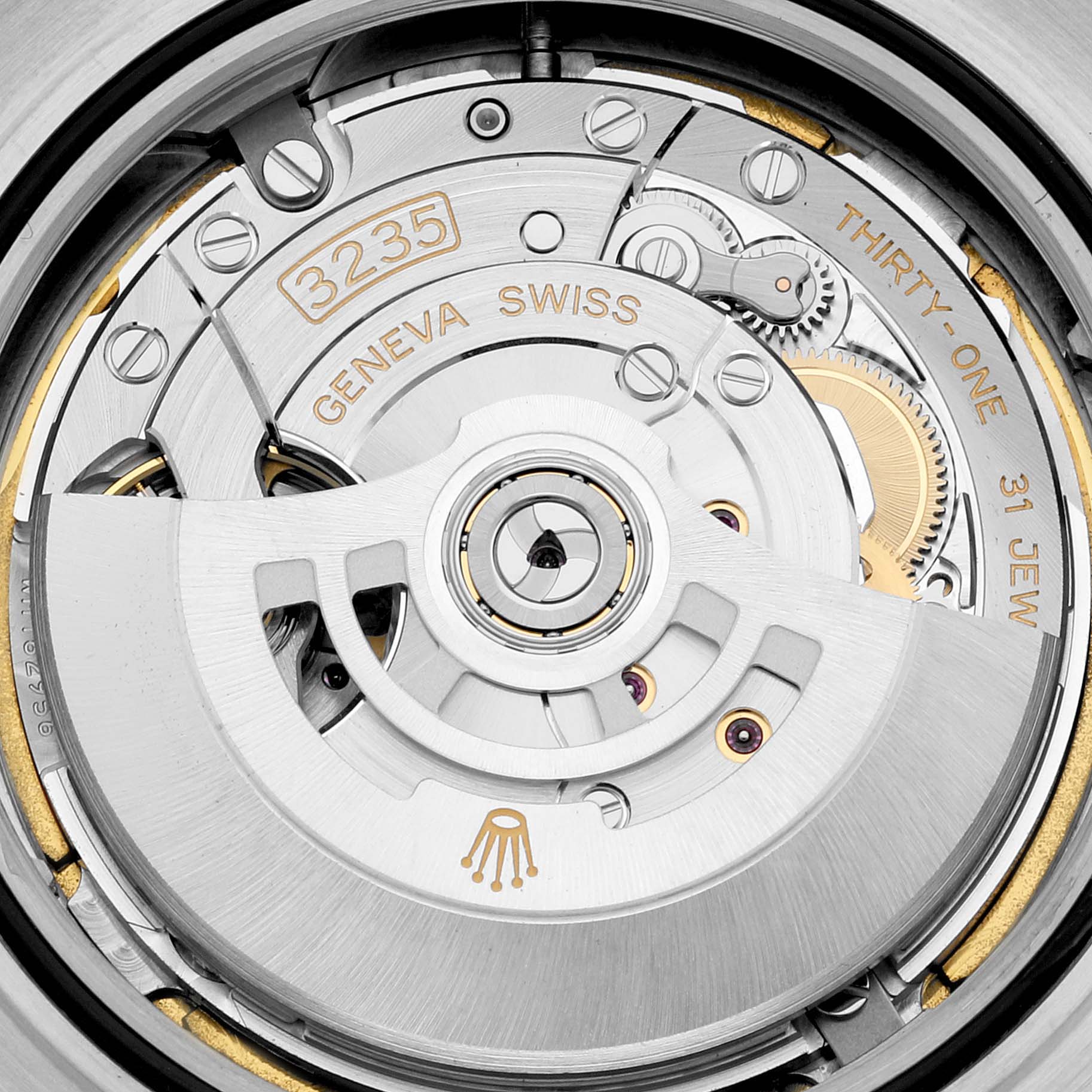 The image shows a close-up of the movement mechanism of a Rolex Yacht-Master 226659 Men's White Gold Black Dial 226659 Men's White Gold Black Dial watch, highlighting the intricate components and engravings.