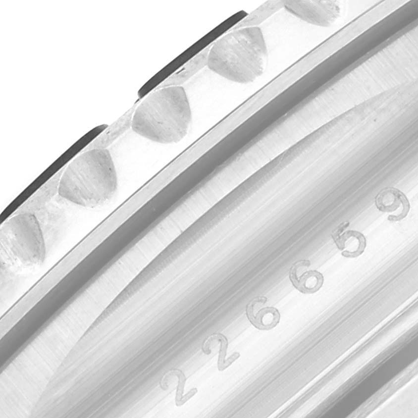 This image shows a close-up of the bezel and case of the Rolex Yacht-Master 226659 Men's White Gold Black Dial 226659 Men's White Gold Black Dial watch, highlighting the serial numbers.