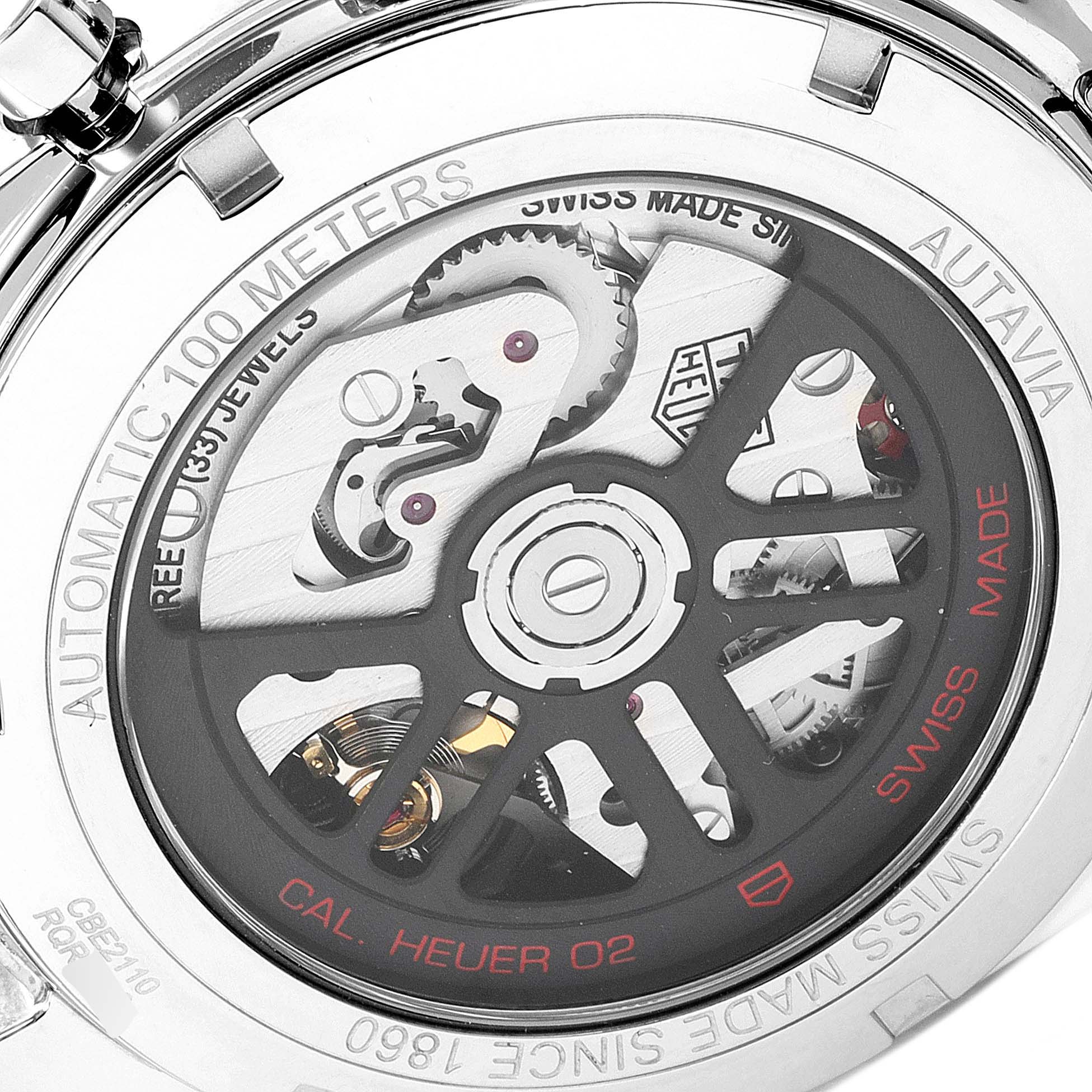 The image shows the back view of a Tag Heuer Autavia CBE2110.BA0687 Men's Stainless Steel Black Dial CBE2110.BA0687 Men's Stainless Steel Black Dial watch, highlighting its automatic movement with visible gears and components.