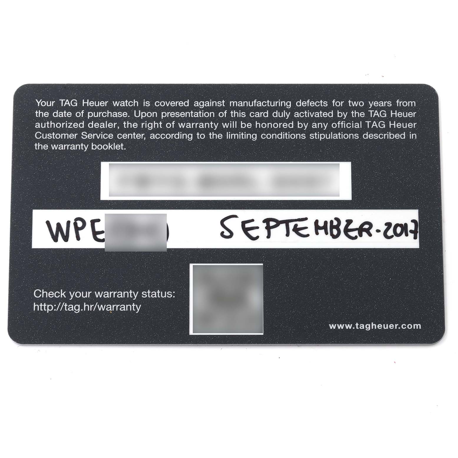 The image shows the warranty card for a Carrera model Tag Heuer watch.