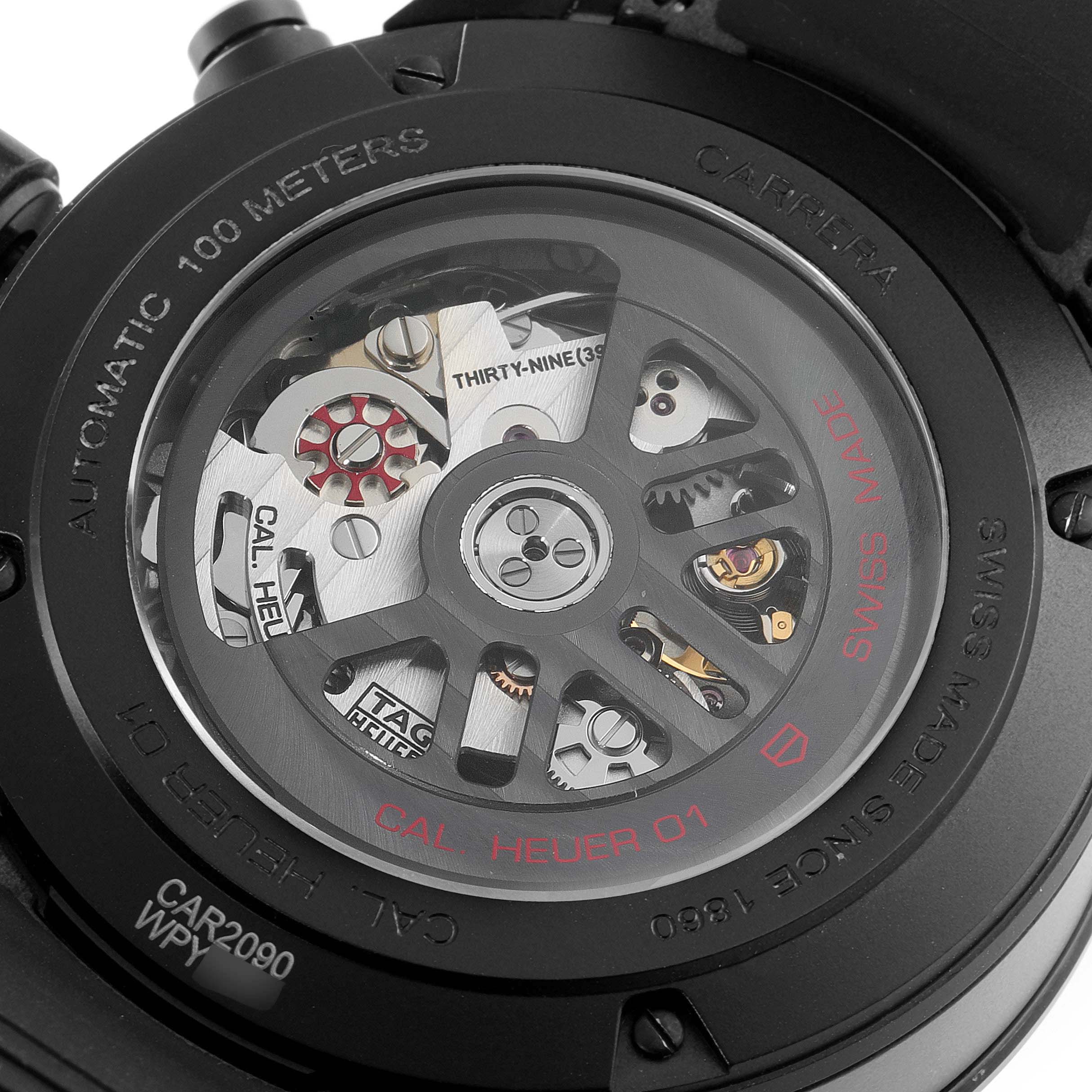 This is a close-up view of the back of a Tag Heuer Carrera CAR2090.BH0729 Men's Ceramic Black Dial CAR2090.BH0729 Men's Ceramic Black Dial watch, showing its automatic movement and internal mechanism.