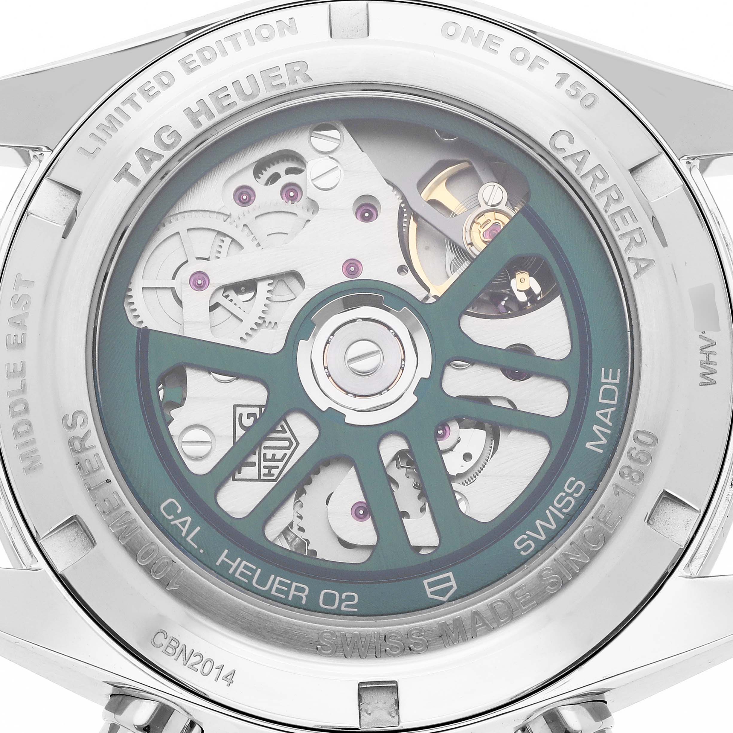 The image shows the back of a Tag Heuer Carrera CBN2014.BA0642 Men's Stainless Steel Green Dial CBN2014.BA0642 Men's Stainless Steel Green Dial watch, highlighting the mechanical movement and inscriptions.