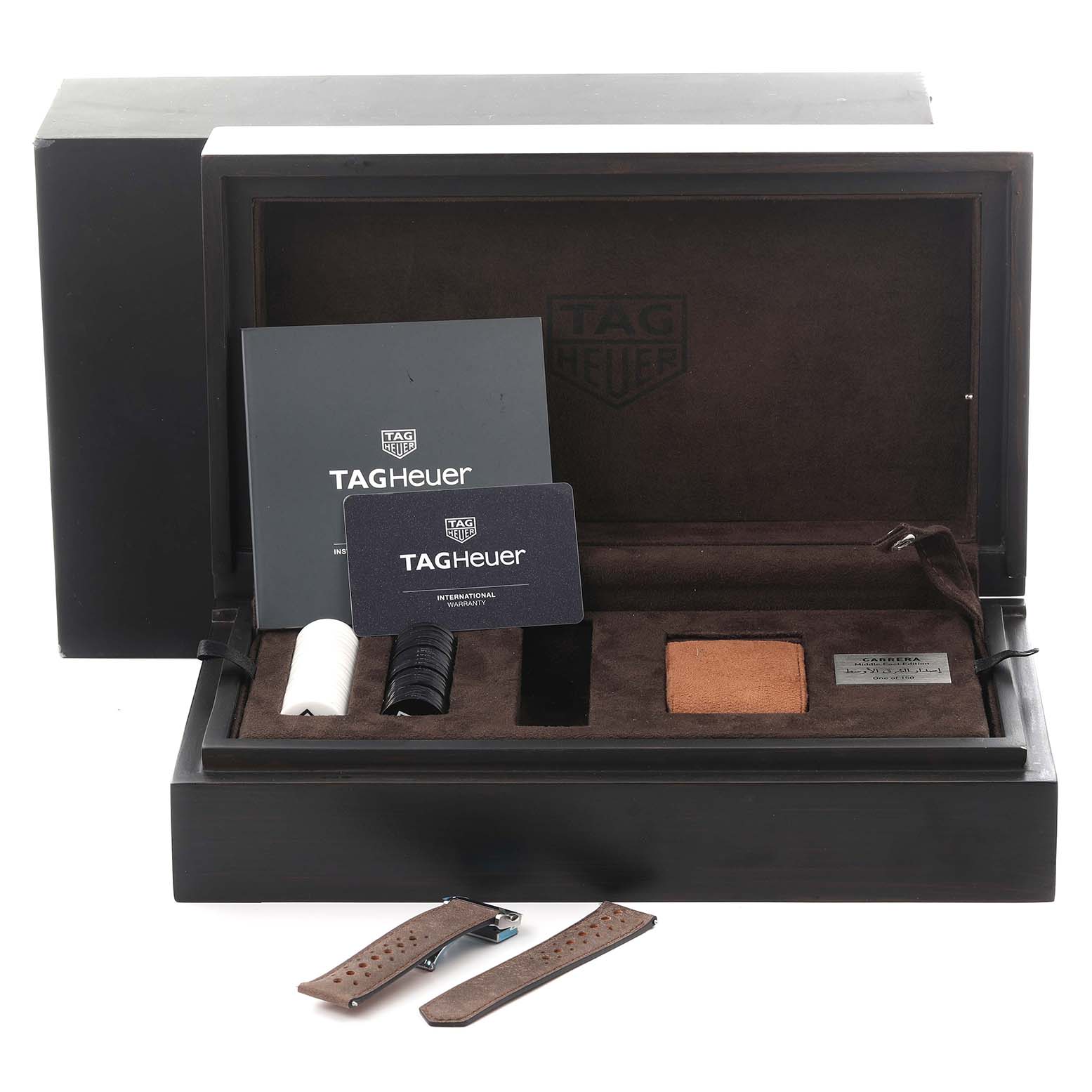 The image shows a Tag Heuer Carrera CBN2014.BA0642 Men's Stainless Steel Green Dial CBN2014.BA0642 Men's Stainless Steel Green Dial watch box with accessories, including straps, a cleaning cloth, and documentation, from a front angle.