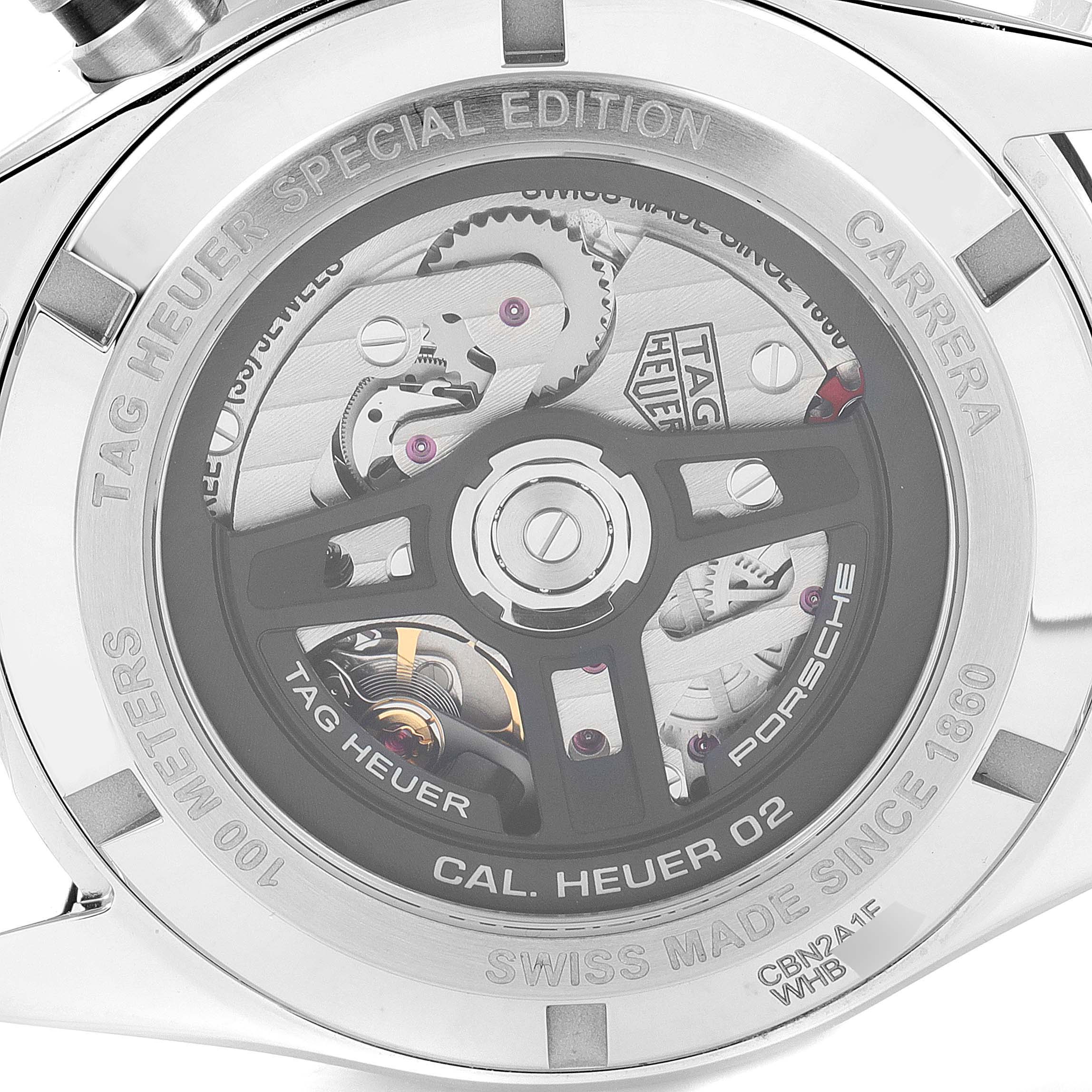 The image shows the back view of the Tag Heuer Carrera watch, highlighting the intricate movement and special edition markings.