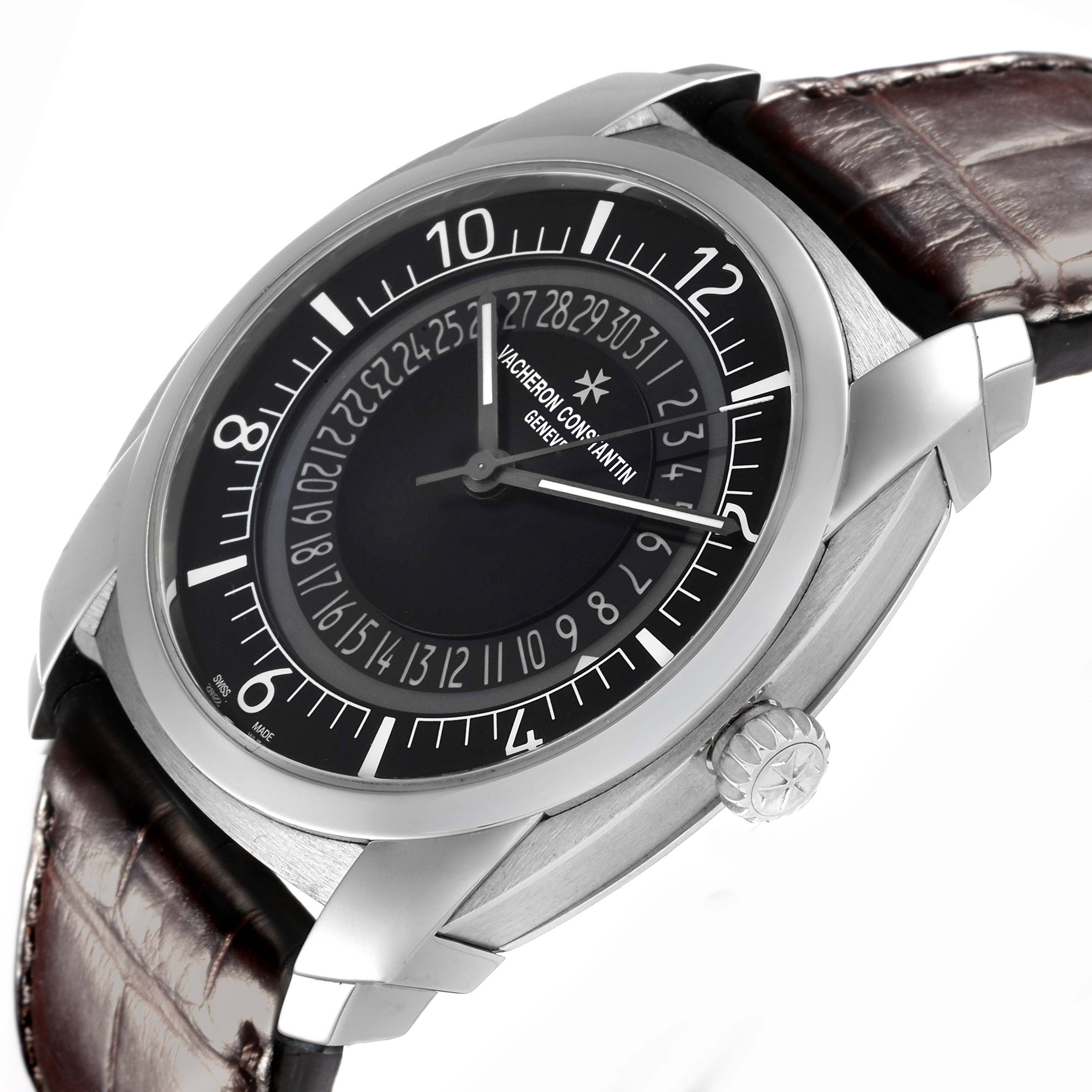 The Vacheron Constantin Quai de l'Ile watch is shown at a tilted angle, displaying the dial, crown, and leather strap.