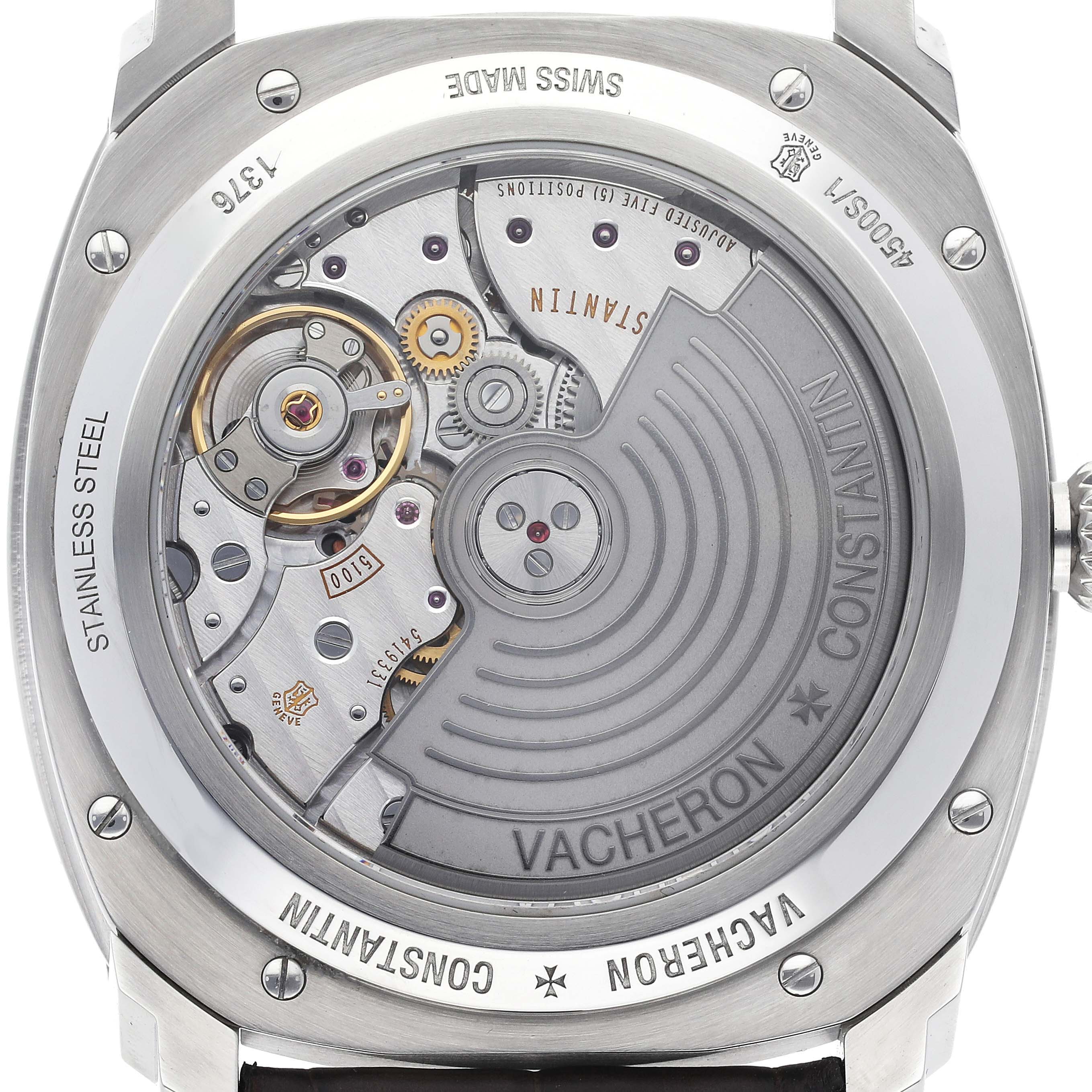 The image shows the back case and movement of a Vacheron Constantin Quai de L'Ile watch, highlighting its mechanical components.