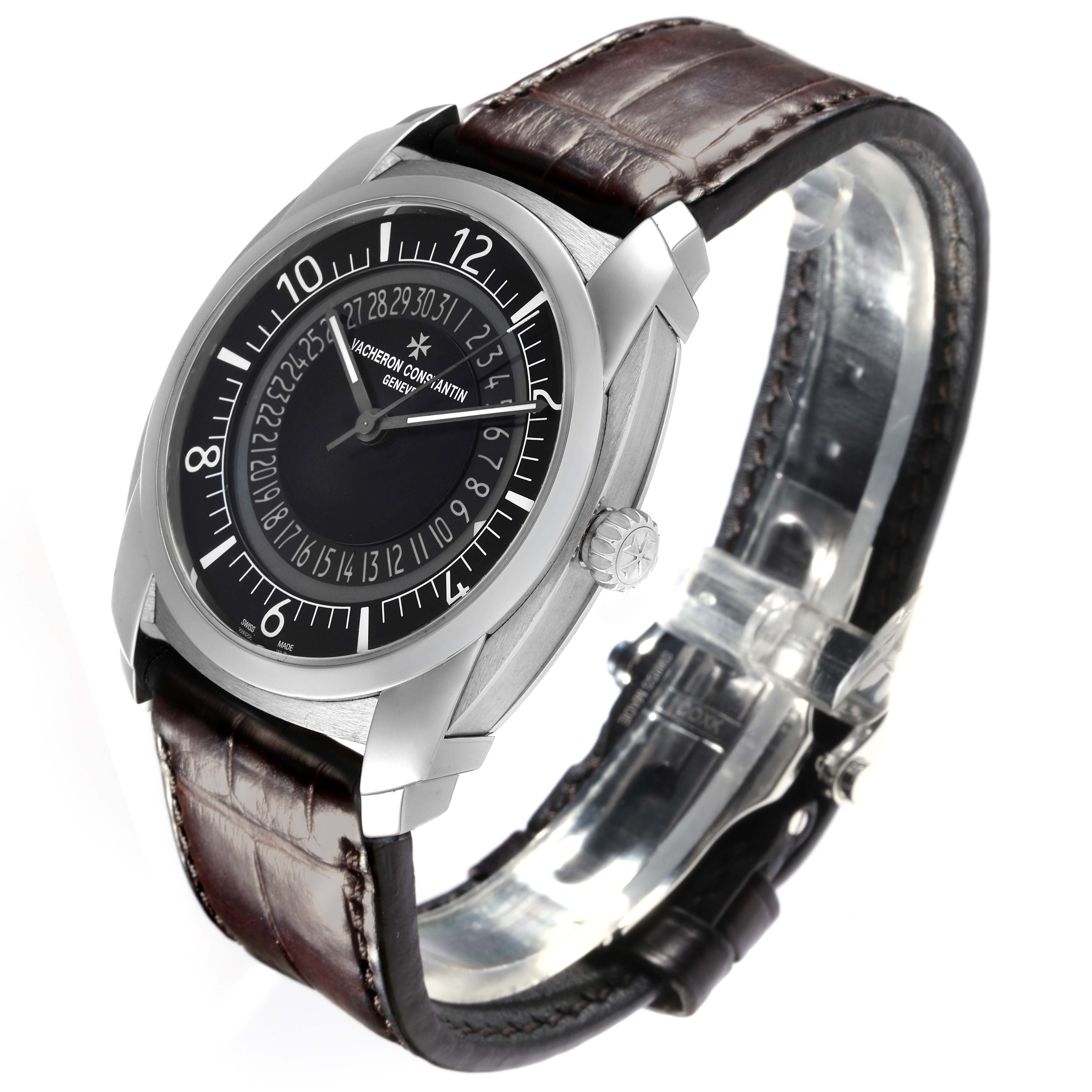 The Vacheron Constantin Quai de l'Ile watch is shown at a three-quarter angle, highlighting the face, bezel, crown, and leather strap.