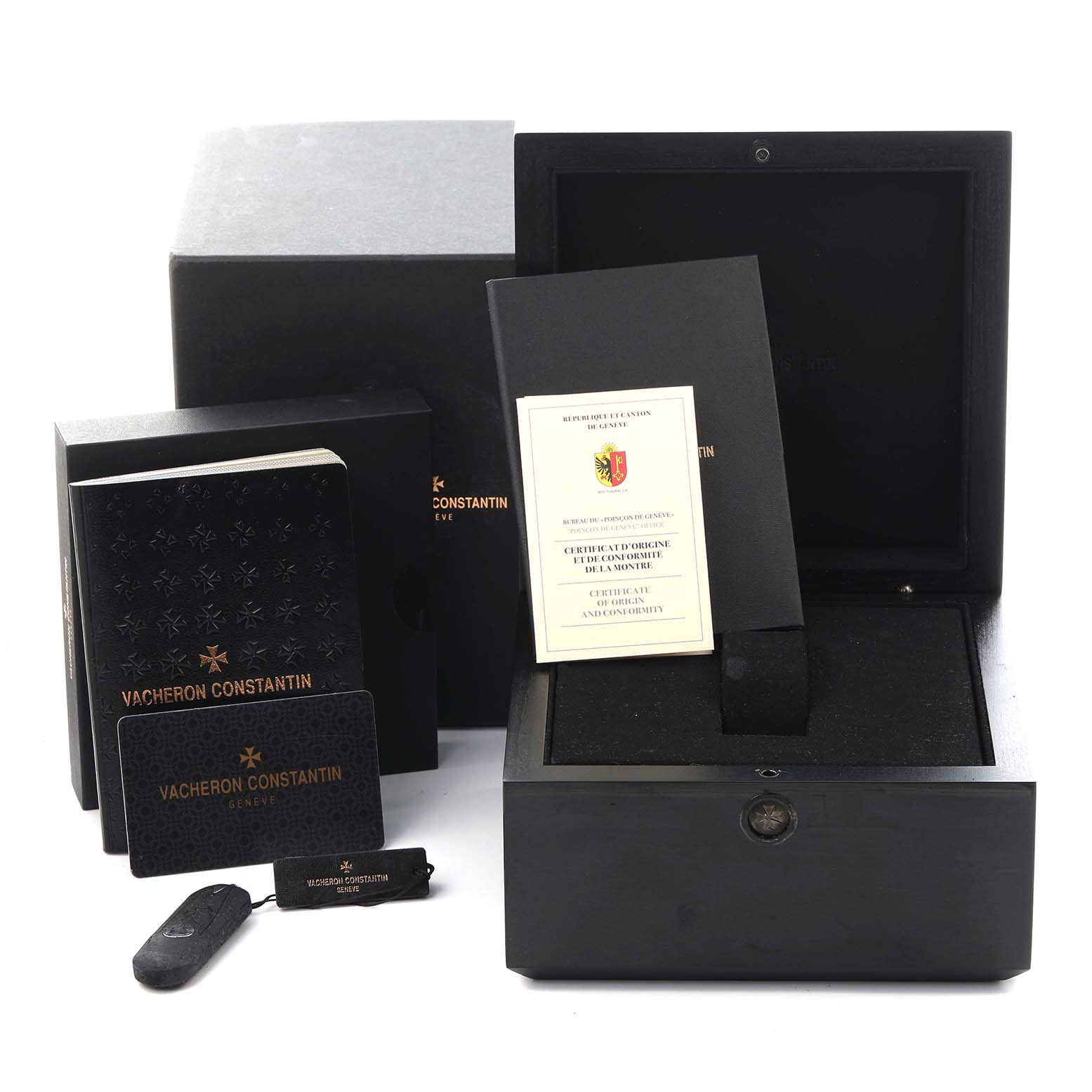 The image shows the Vacheron Constantin Quai de l'Ile packaging, including its box, booklet, and accessories laid out.