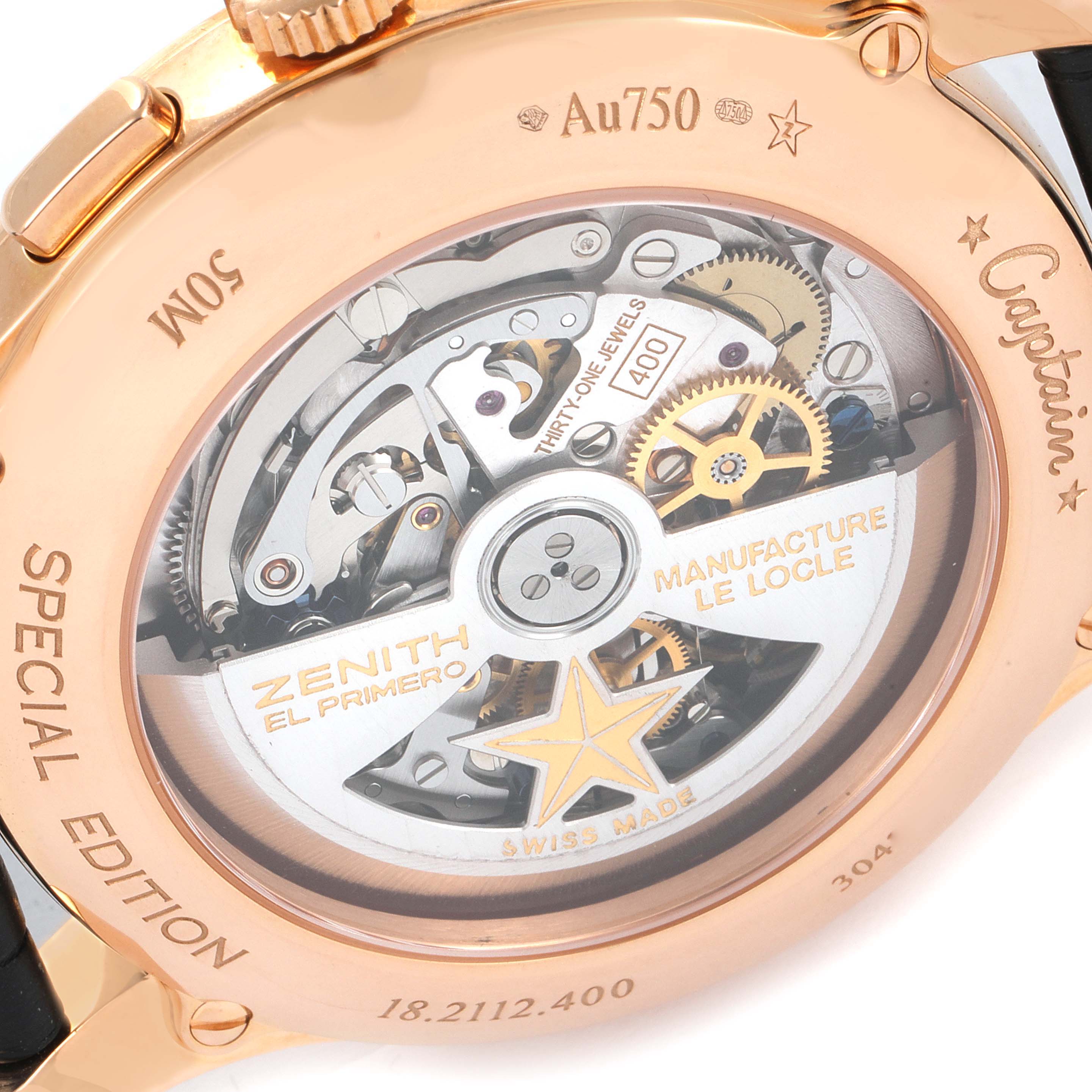 The image shows the back of the Zenith Captain 18.2112.400 Men's Rose Gold Black Dial 18.2112.400 Men's Rose Gold Black Dial watch, highlighting its internal mechanism and branding details.