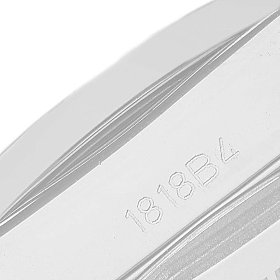 The image shows a close-up of the engravings on the side of the Breitling W72348 Women's Stainless Steel Mother of Pearl Dial W72348 Women's Stainless Steel Mother of Pearl Dial Galactic 29mm Mother of Pearl Diamond Dial Steel Ladies Watch W72348.