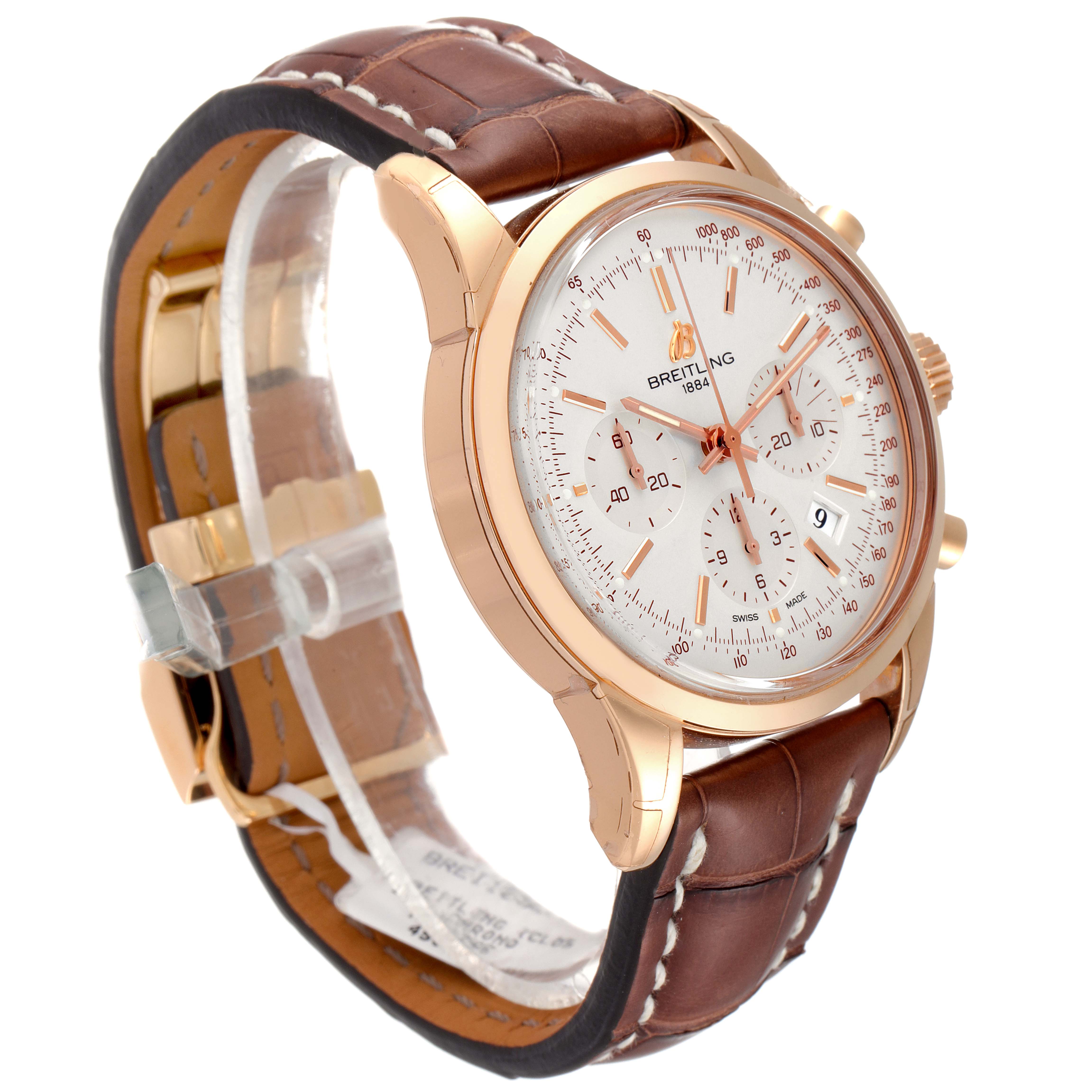 The image shows a side angle of the Breitling Transocean RB0152 Men's Rose Gold Silver Dial RB0152 Men's Rose Gold Silver Dial watch, highlighting the case, dial, and leather strap.