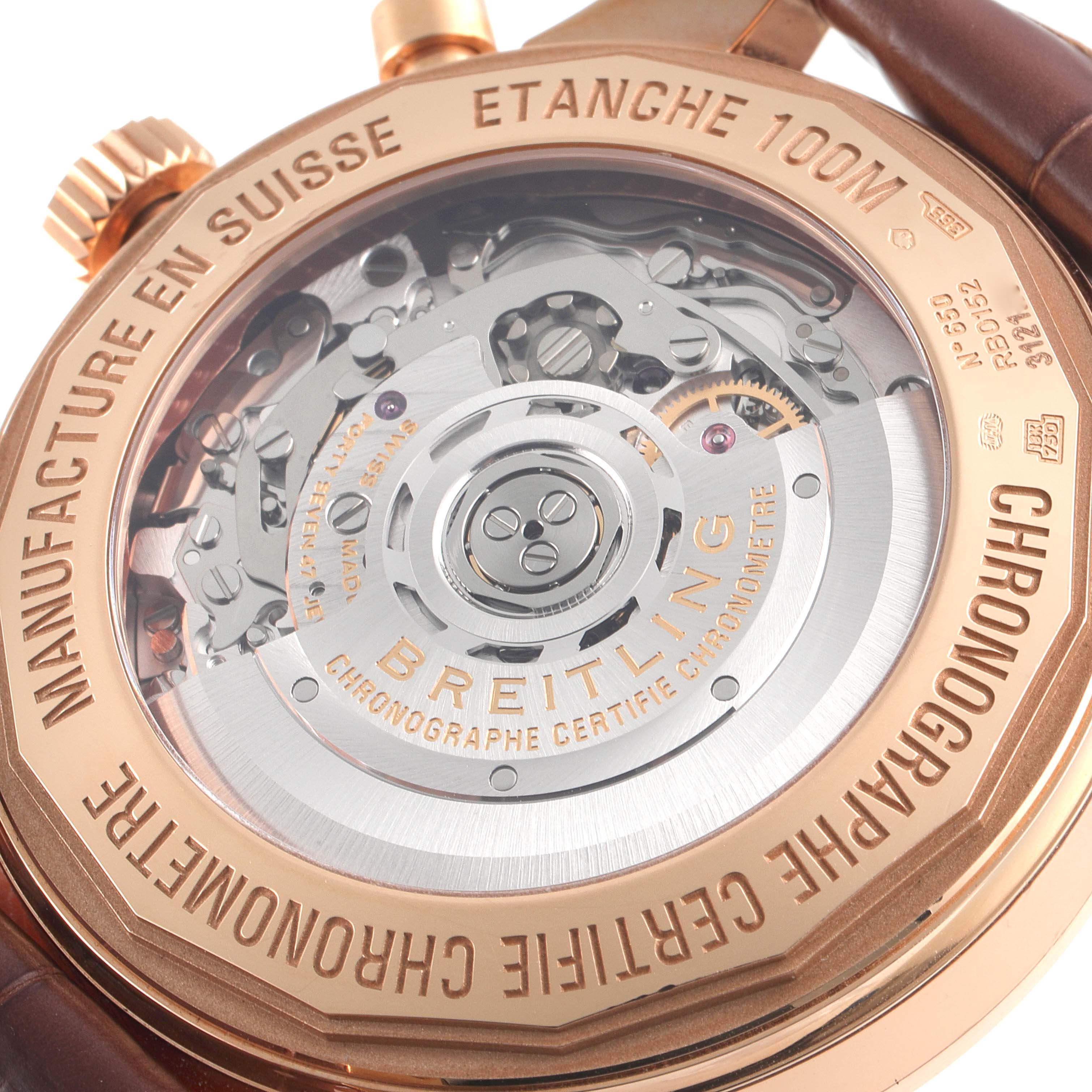 The image shows the back of a Breitling Transocean RB0152 Men's Rose Gold Silver Dial RB0152 Men's Rose Gold Silver Dial watch, highlighting the mechanical movement and engraving details.