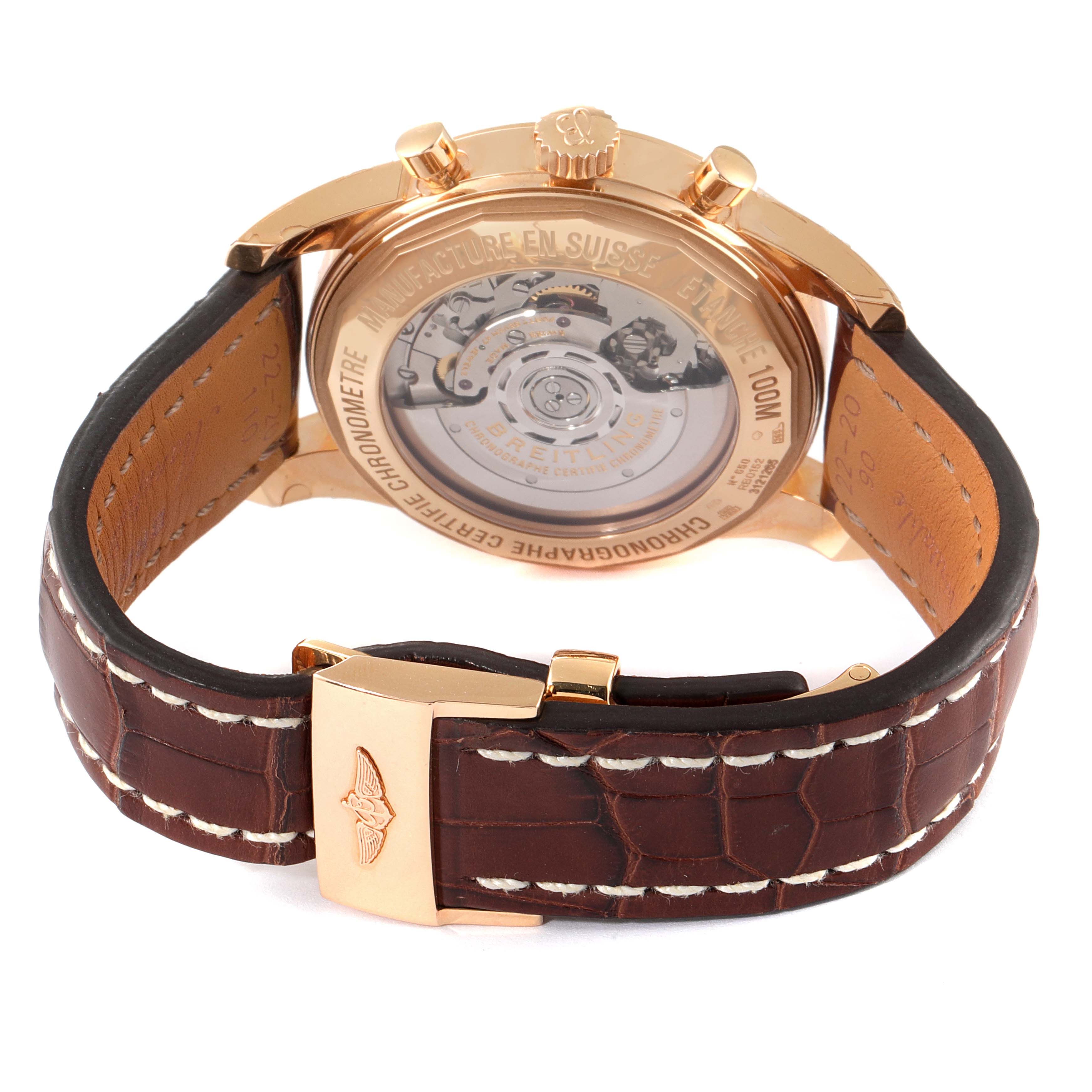 The image shows the back angle of a Breitling Transocean RB0152 Men's Rose Gold Silver Dial RB0152 Men's Rose Gold Silver Dial watch, highlighting its exposed movement and brown leather strap.