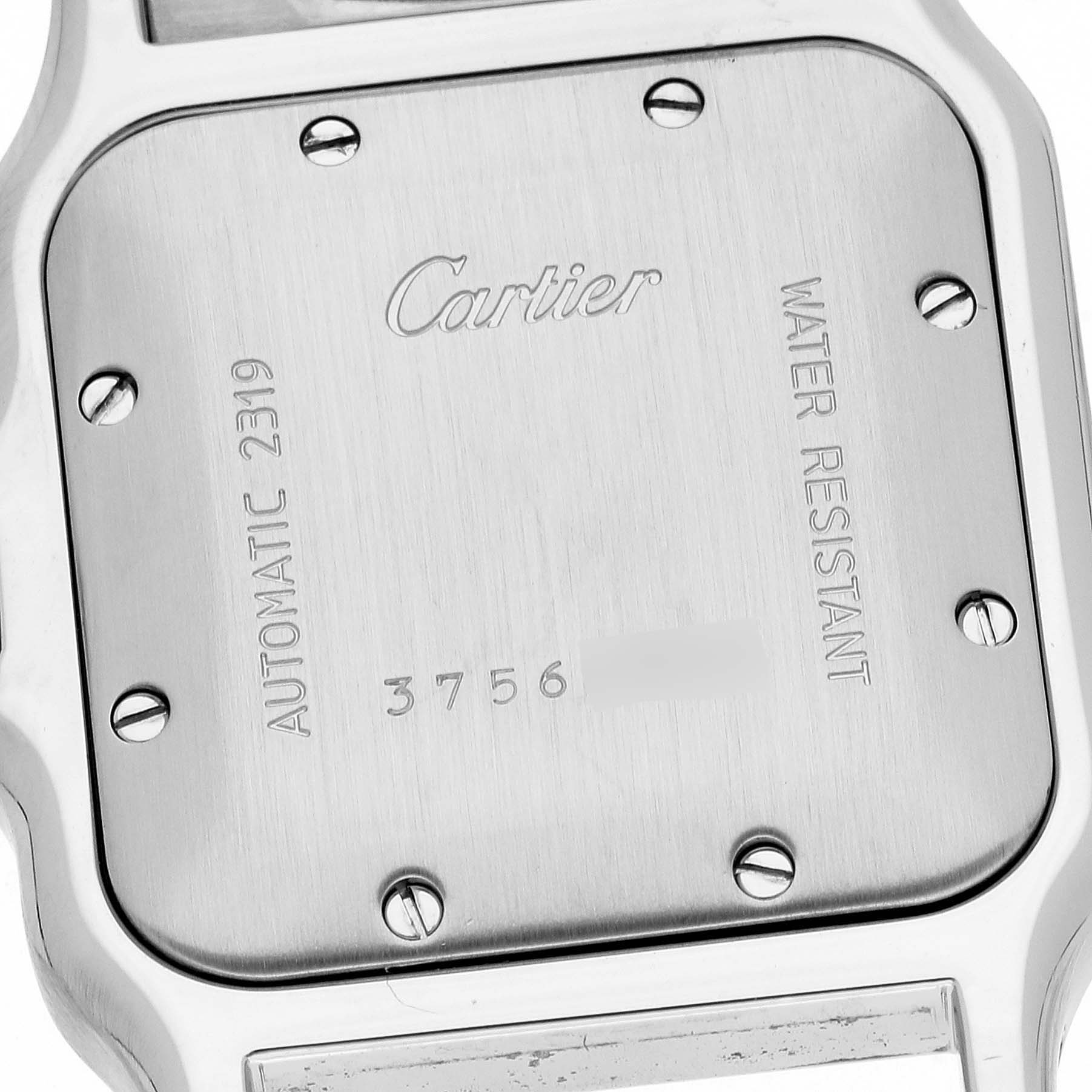 This image shows the case back of a Santos model by Cartier, viewed up close.
