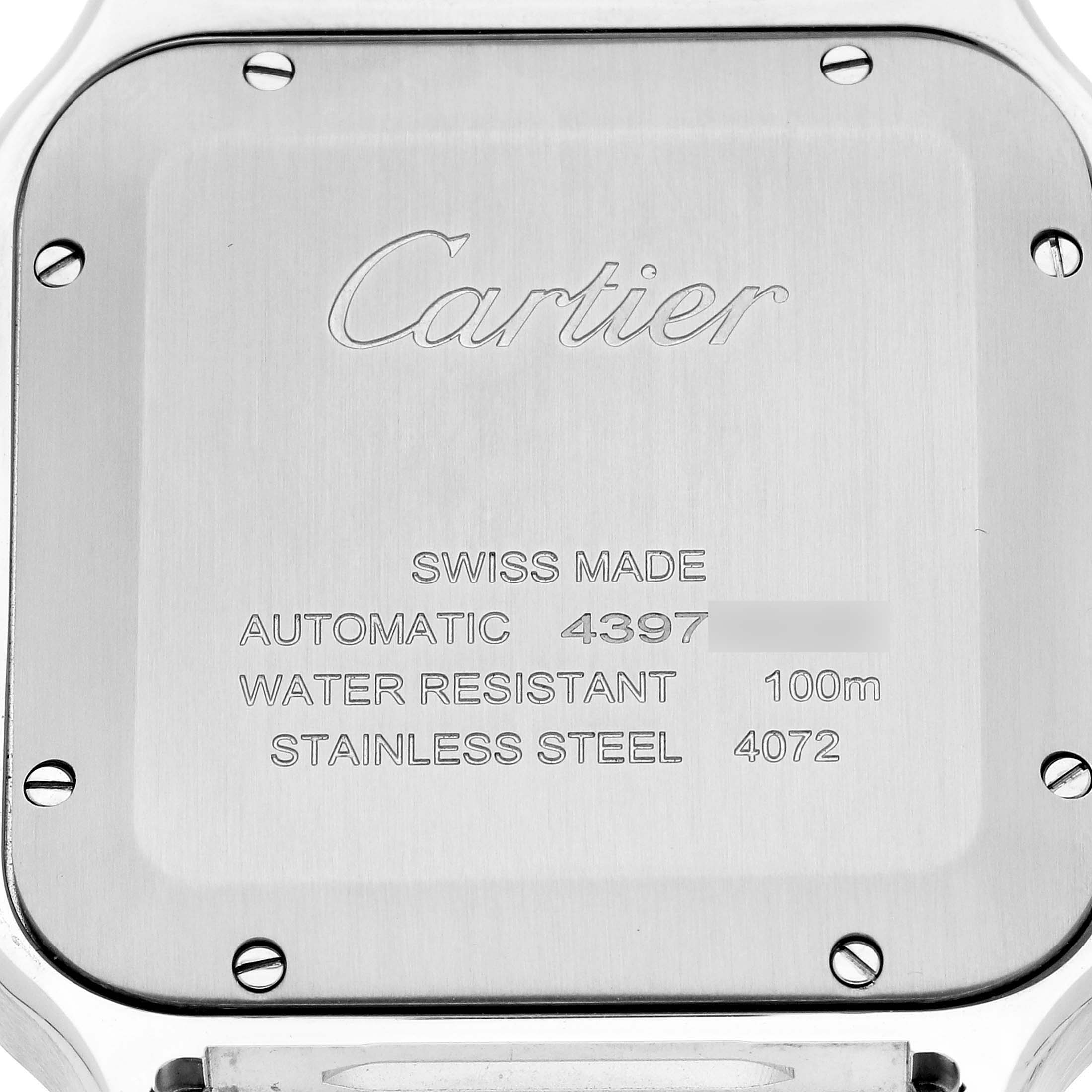 This image shows the back case of a Cartier Santos WSSA0048 Men's Stainless Steel Blue Dial WSSA0048 Men's Stainless Steel Blue Dial watch, including the brand engraving and technical specifications.