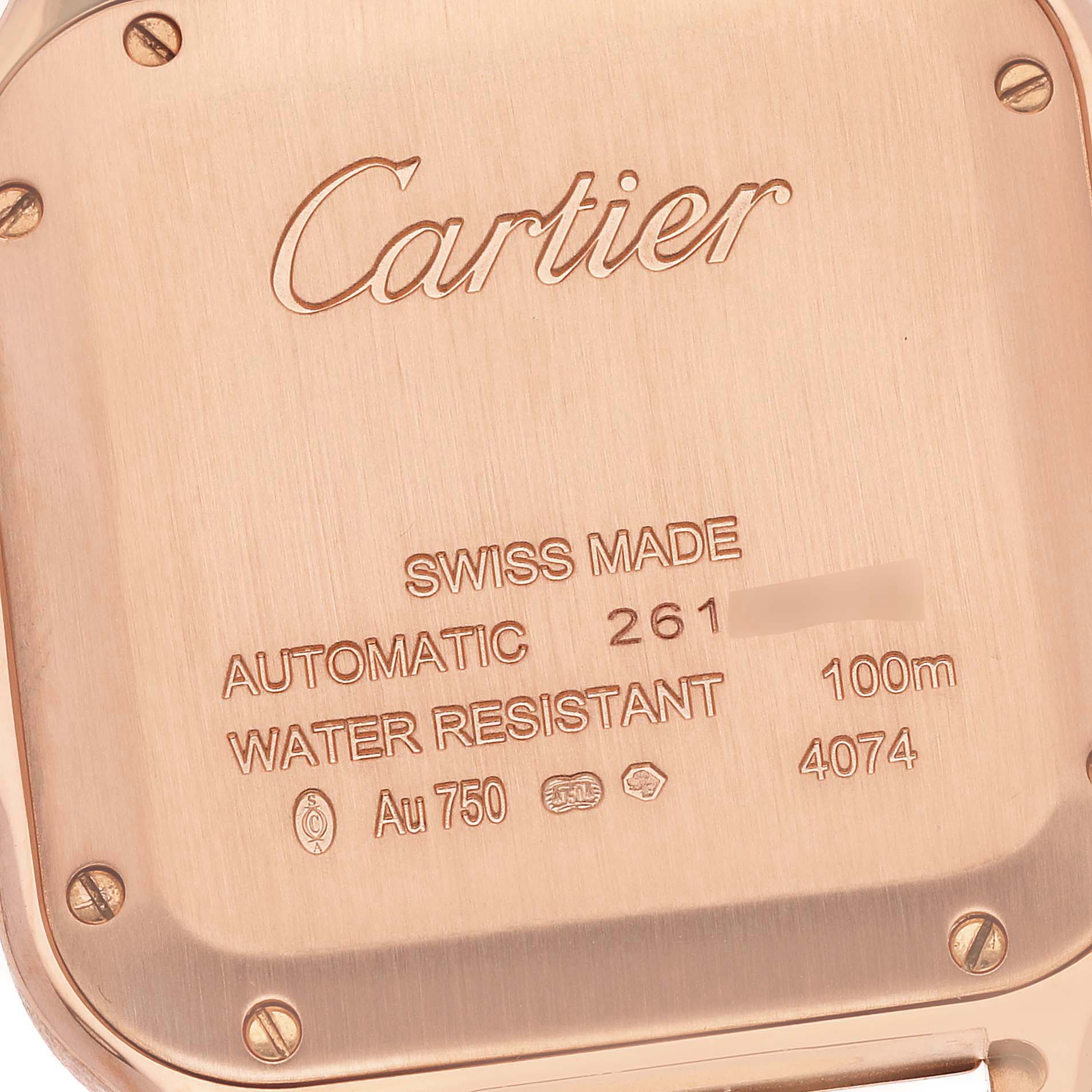 The image shows the back case of a Cartier Santos WGSA0012 Men's Rose Gold Silver Dial WGSA0012 Men's Rose Gold Silver Dial watch, displaying the brand, model information, and specifications.