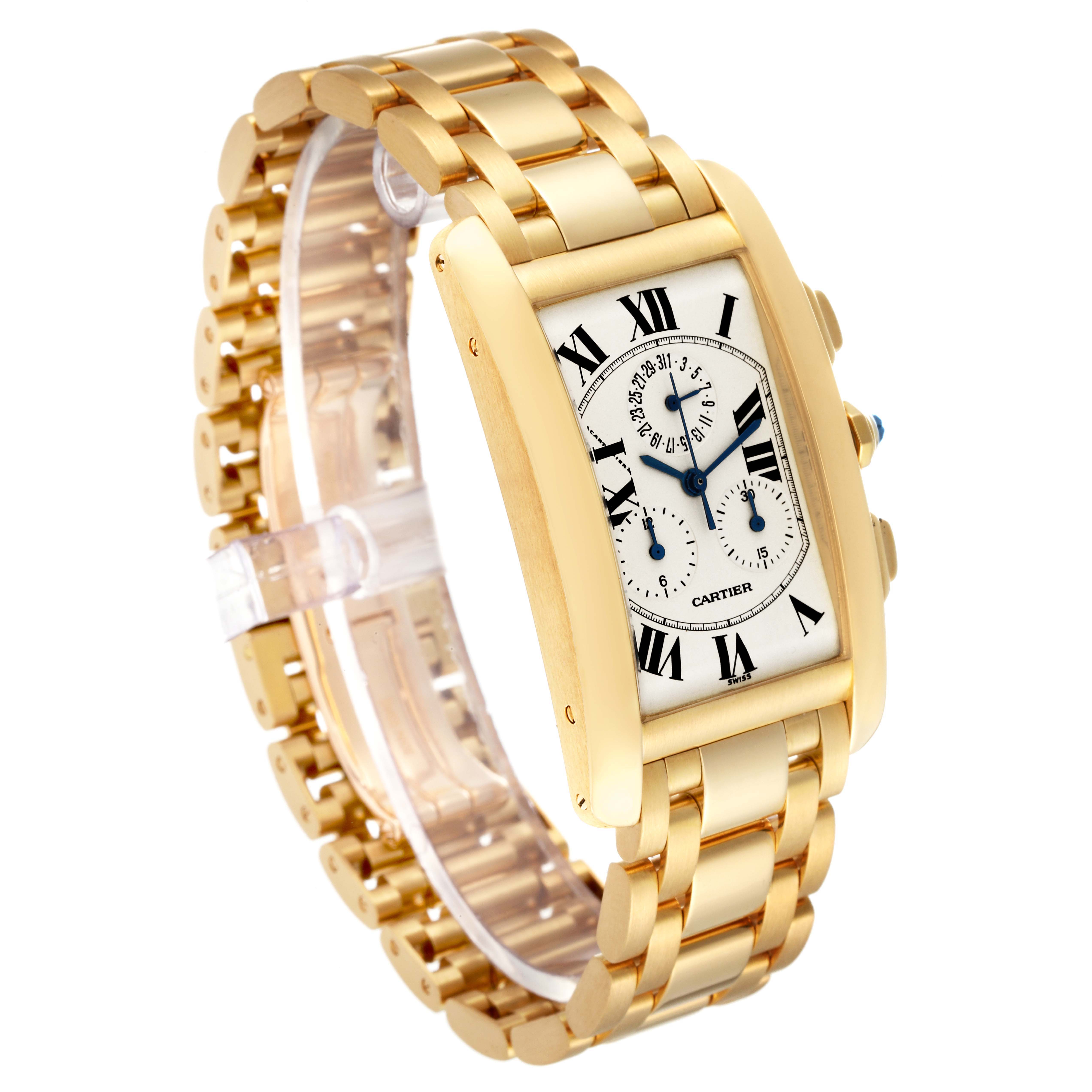 This image shows a Cartier Tank Americaine W2601156 Men's Yellow Gold Silver Dial W2601156 Men's Yellow Gold Silver Dial watch from a three-quarter angle, highlighting the watch face and gold bracelet.