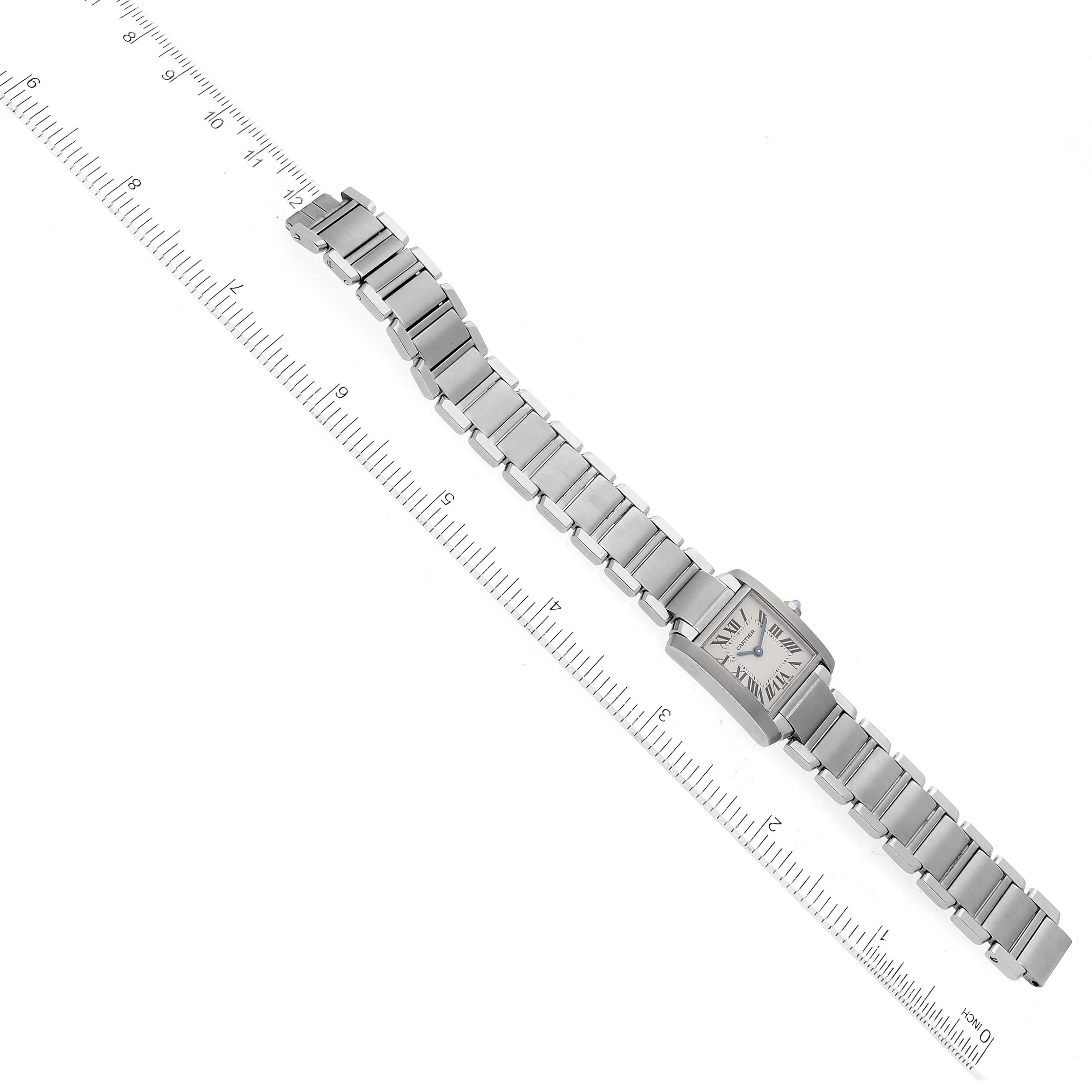 The Cartier Tank Francaise W51008Q3 Women
s Stainless Steel Silver Dial W51008Q3 Women
s Stainless Steel Silver Dial watch is shown laid flat, highlighting the face and full bracelet length, with rulers for scale.
