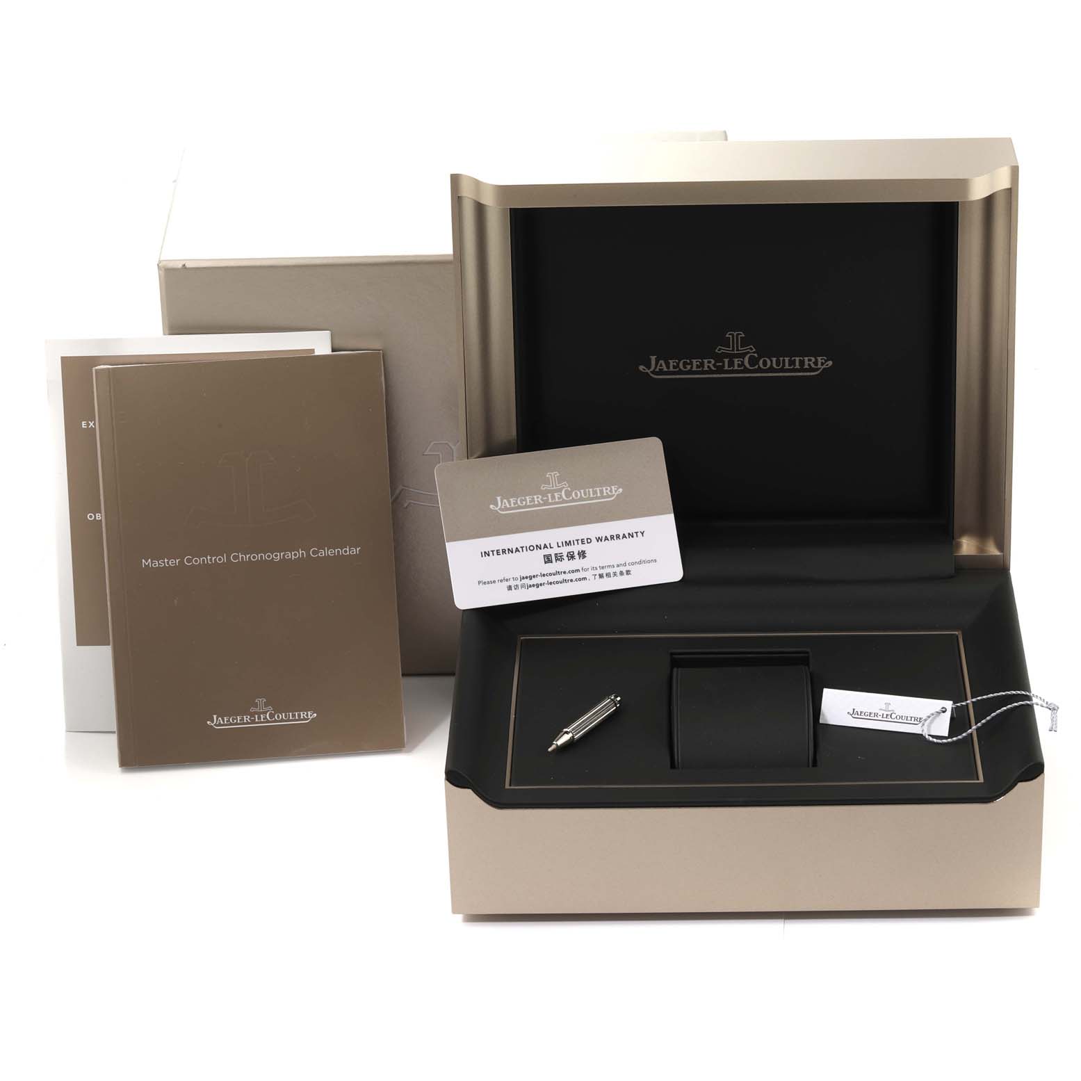 This image shows the packaging of a Jaeger-LeCoultre Master model watch, including the box, warranty card, and manuals.