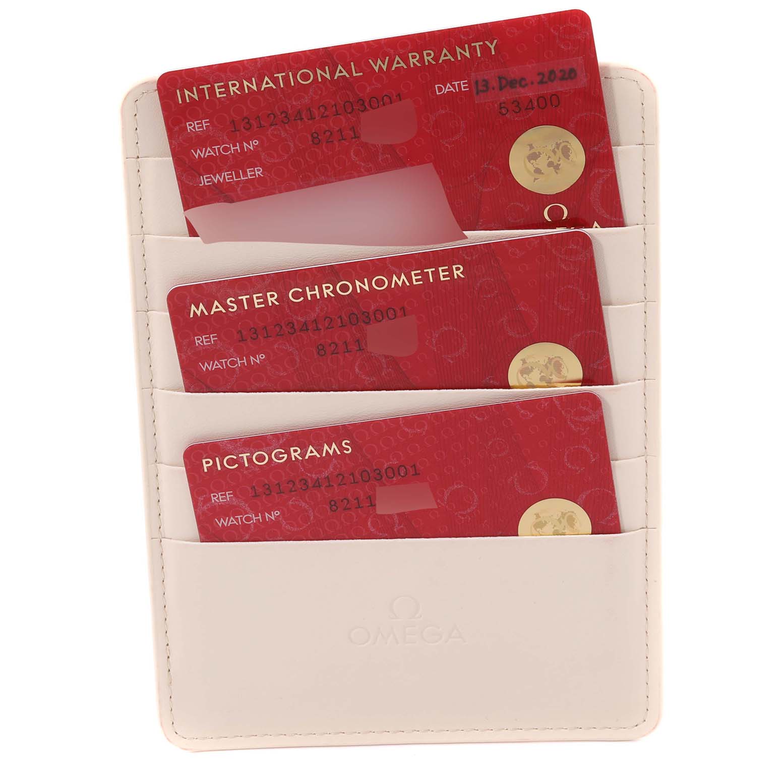 The image shows three red cards inside a white cardholder for the Omega Constellation 131.23.41.21.03.001 Men's Steel and Gold (two tone) Blue Dial 131.23.41.21.03.001 Men's Steel and Gold (two tone) Blue Dial model watch, including international warranty, master chronometer, and pictograms cards.