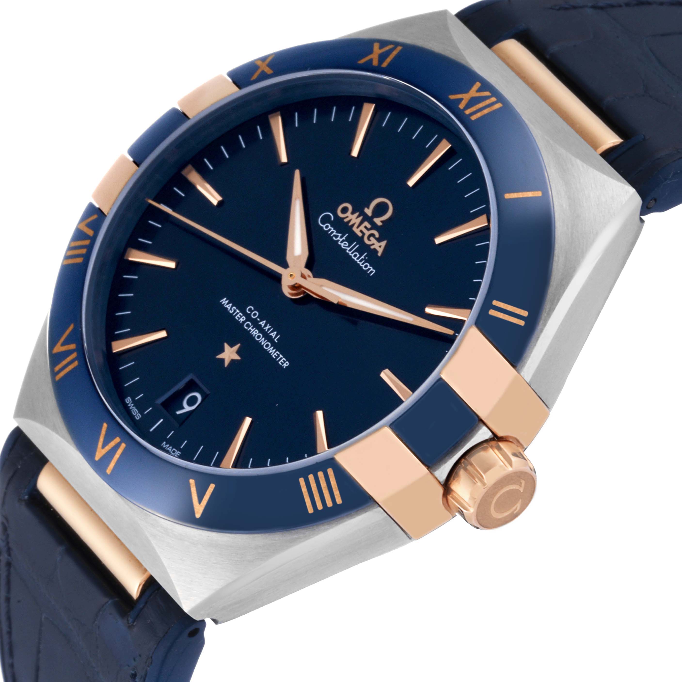 This image shows the dial, bezel, crown, and part of the strap of the Omega Constellation 131.23.41.21.03.001 Men's Steel and Gold (two tone) Blue Dial 131.23.41.21.03.001 Men's Steel and Gold (two tone) Blue Dial watch at an angled view.