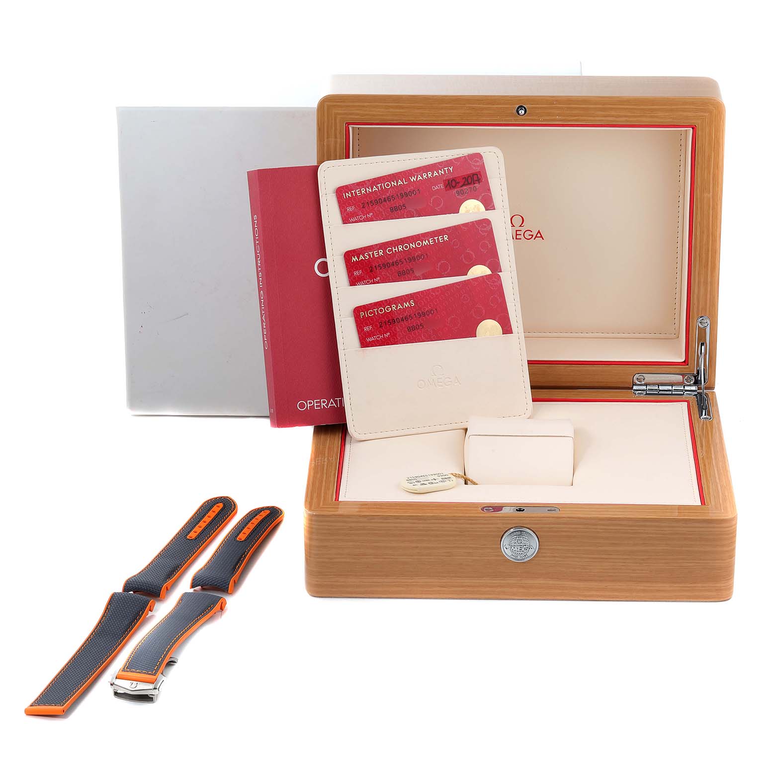 This image shows the Omega Planet Ocean 215.90.46.51.99.001 Men's Titanium Grey Dial 215.90.46.51.99.001 Men's Titanium Grey Dial watch box, documentation, warranty cards, and extra straps.