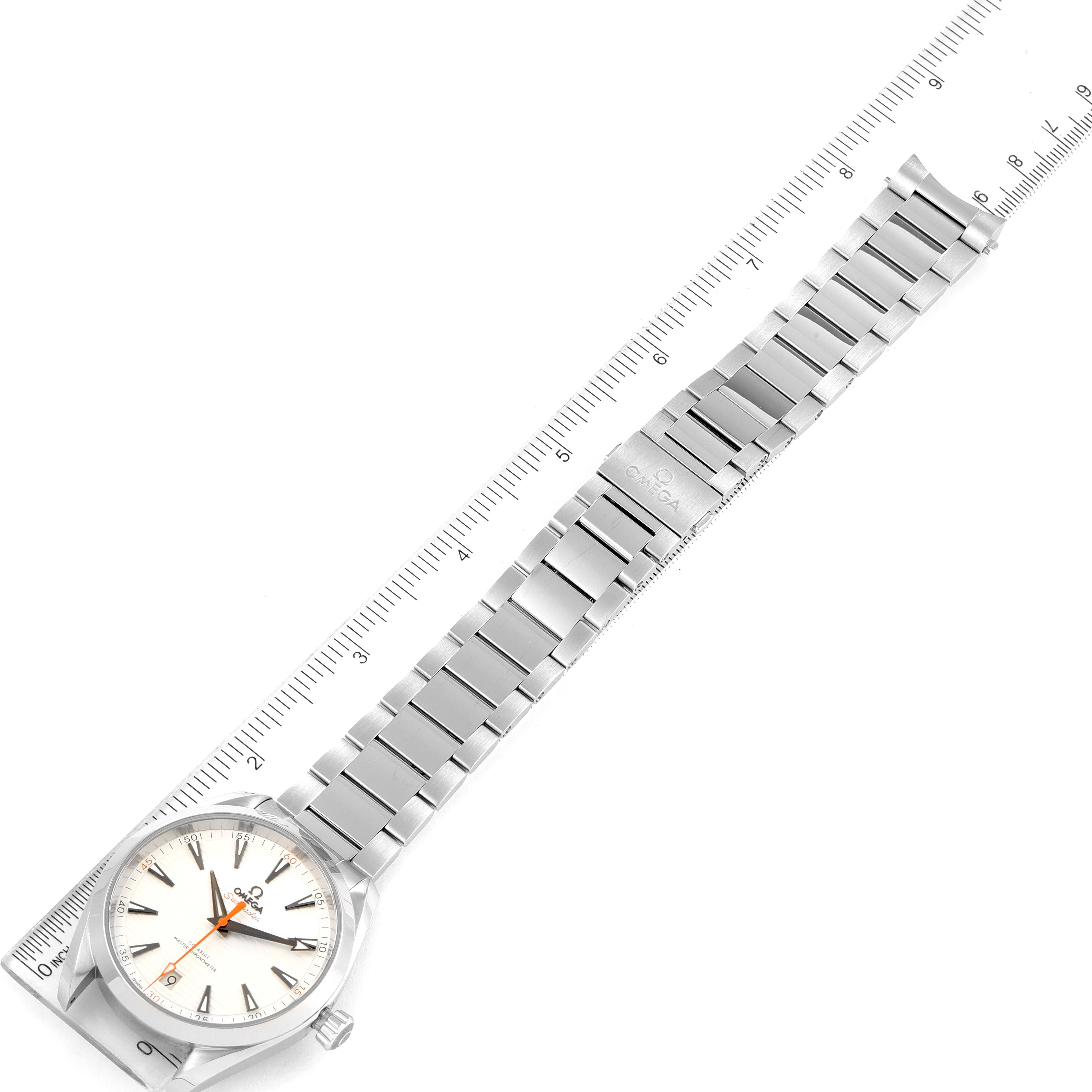 The Omega Aqua Terra 220.10.41.21.02.001 Men
s Stainless Steel Silver Dial 220.10.41.21.02.001 Men
s Stainless Steel Silver Dial watch is shown from an overhead angle with the entire bracelet and part of a ruler visible.