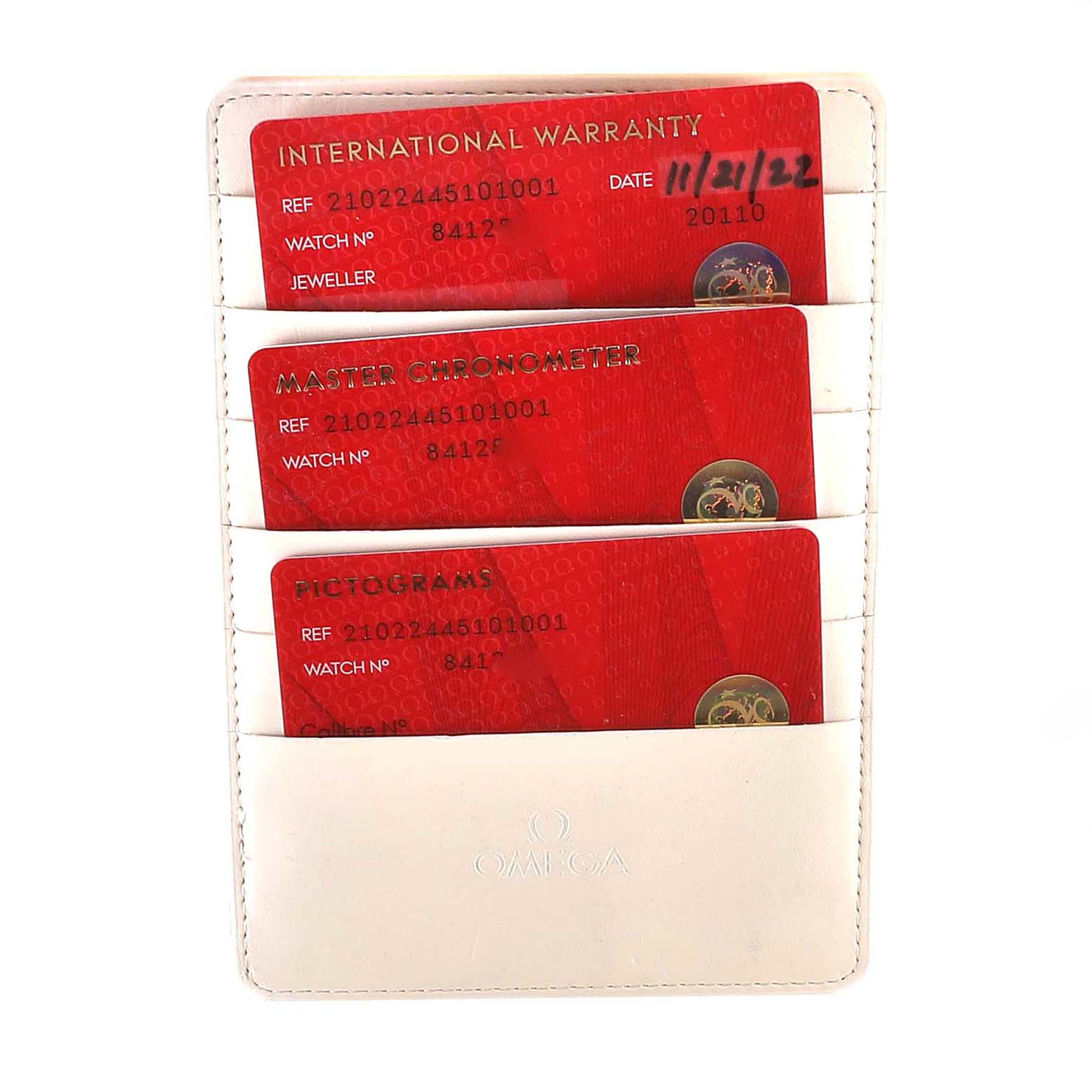 The image shows the warranty cards and documentation holder for an Omega Seamaster 210.20.44.51.01.001 Men's Steel and Gold (two tone) Black Dial 210.20.44.51.01.001 Men's Steel and Gold (two tone) Black Dial watch.