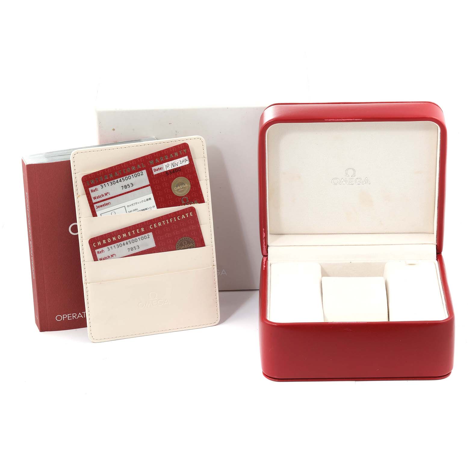 The image shows the packaging, warranty cards, and case of an Omega Speedmaster 311.30.44.50.01.002 Men's Stainless Steel Black Dial 311.30.44.50.01.002 Men's Stainless Steel Black Dial watch at an angled view.