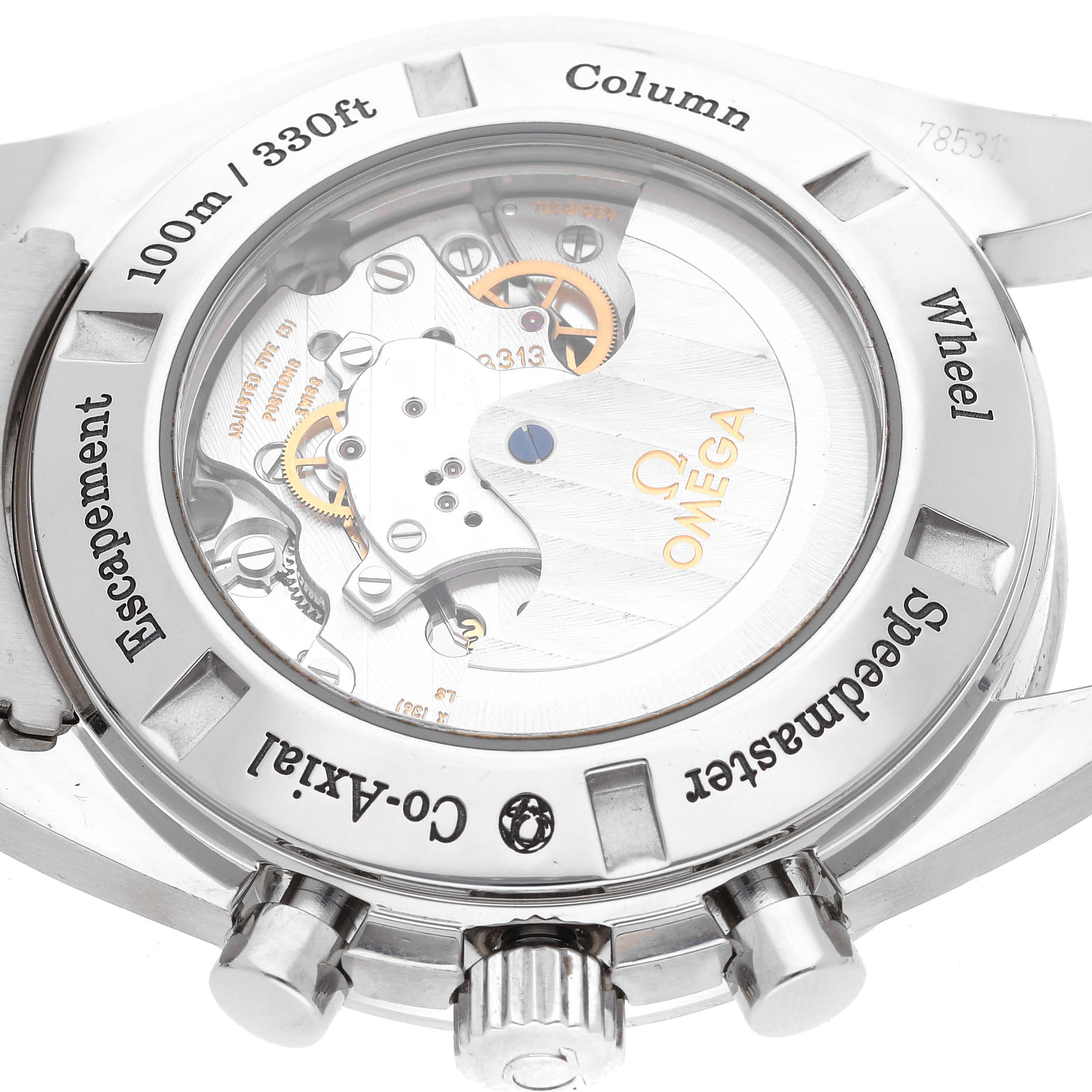 The image shows the back view of the Omega Speedmaster 311.30.44.50.01.002 Men's Stainless Steel Black Dial 311.30.44.50.01.002 Men's Stainless Steel Black Dial, revealing its internal mechanics and engravings.